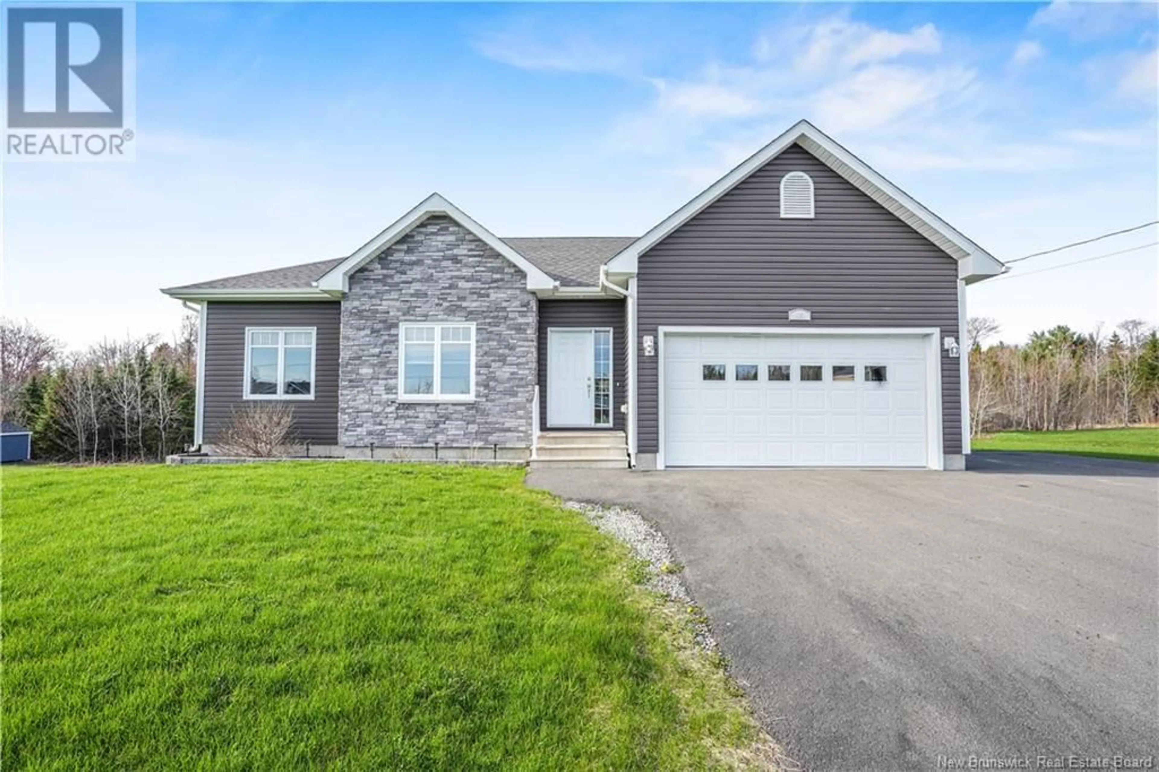 Home with vinyl exterior material, street for 15 COPPERHILL LANE, Killarney Road New Brunswick E3A9V2