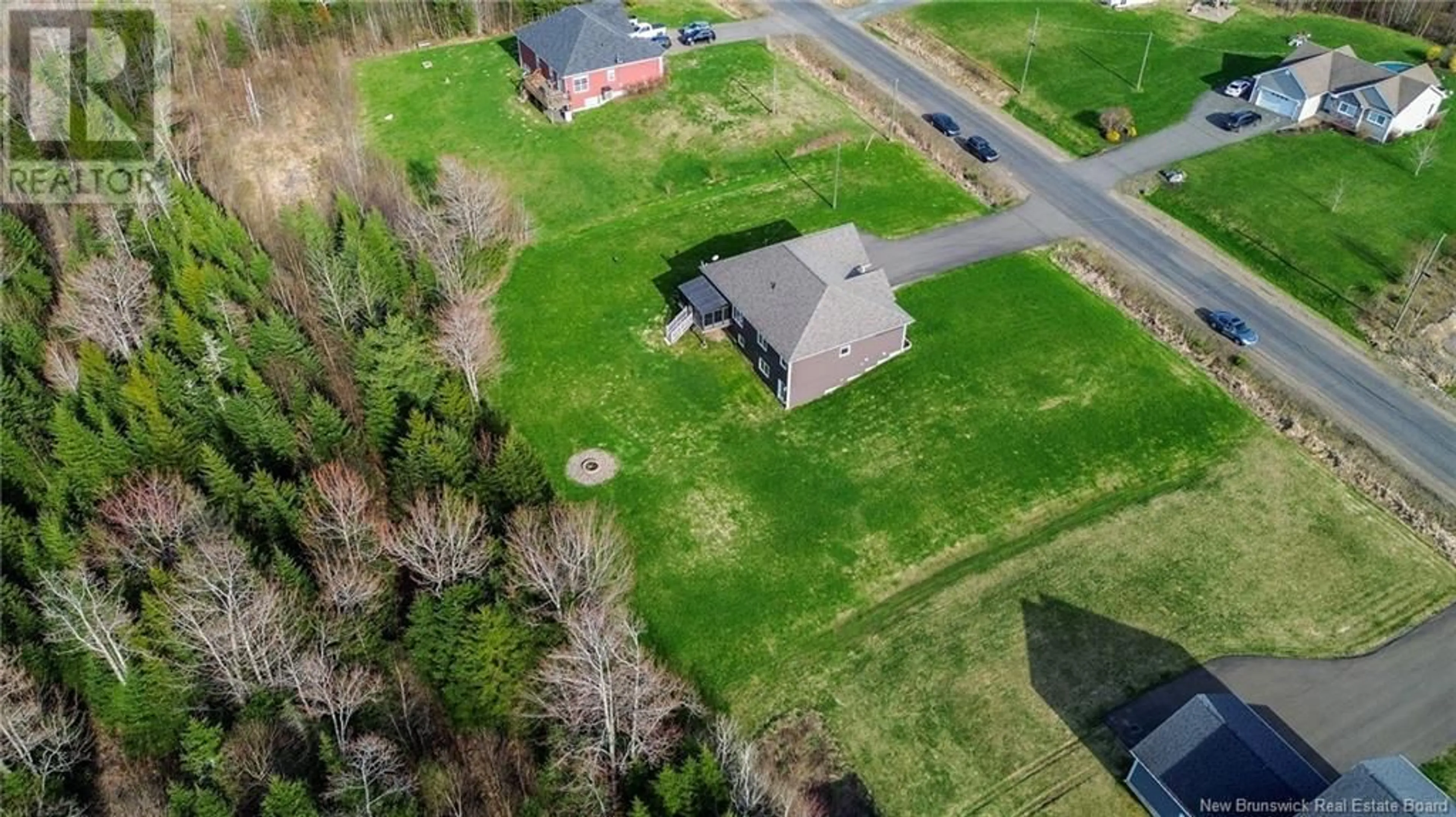 A pic from outside/outdoor area/front of a property/back of a property/a pic from drone, street for 15 COPPERHILL LANE, Killarney Road New Brunswick E3A9V2