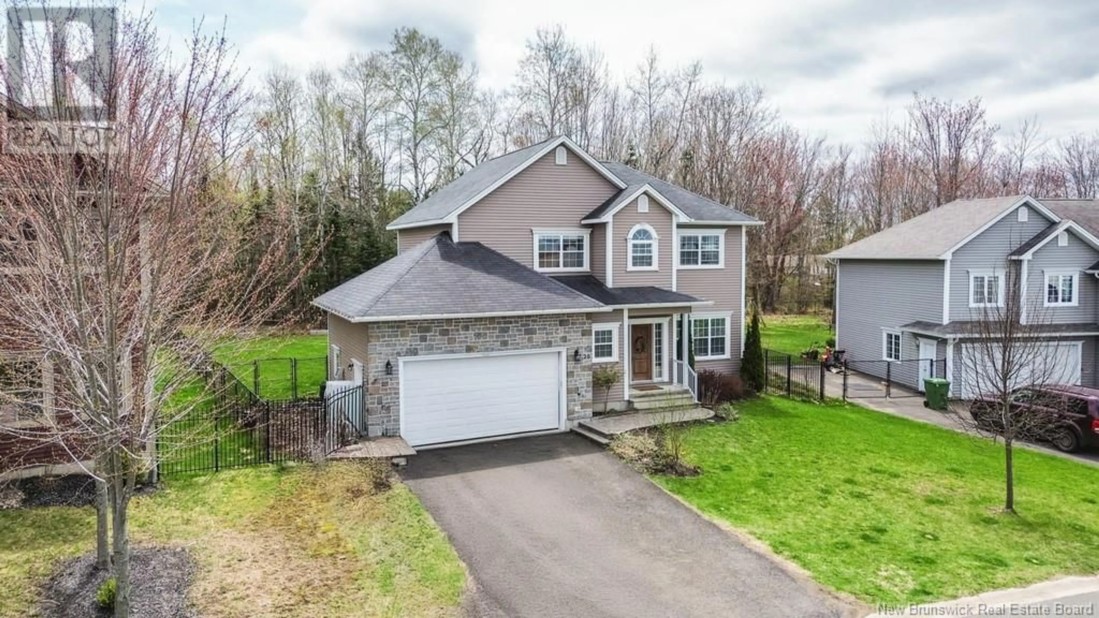 A pic from outside/outdoor area/front of a property/back of a property/a pic from drone, street for 26 CARTER CRESCENT, Oromocto New Brunswick E3V0C3