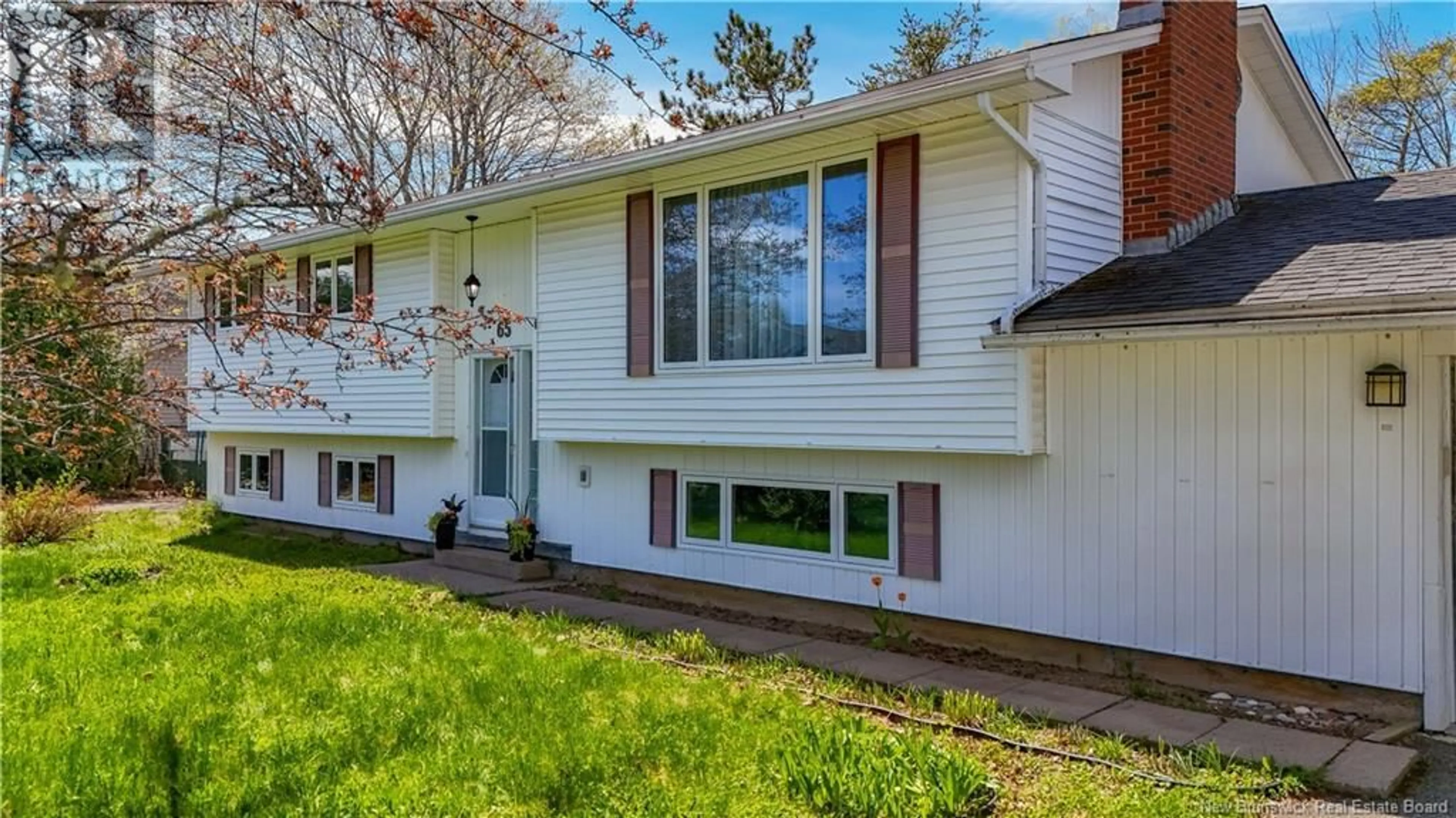 Home with vinyl exterior material, street for 65 OLIVER CRESCENT, New Maryland New Brunswick E3C1E2