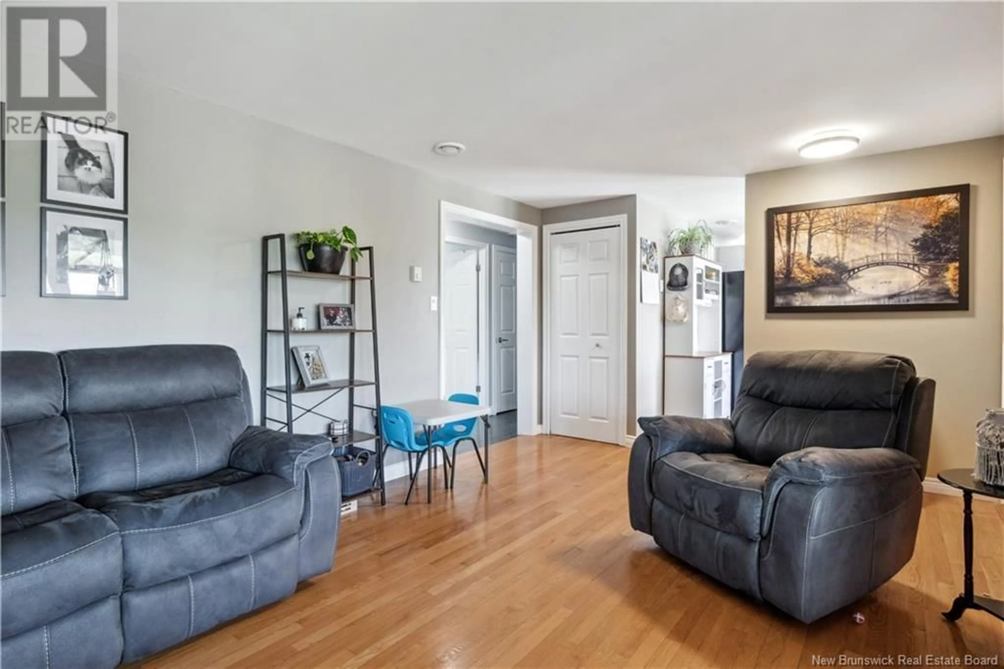 Living room with furniture, wood/laminate floor for 1187 ROYAL, Memramcook New Brunswick E4K1Y3