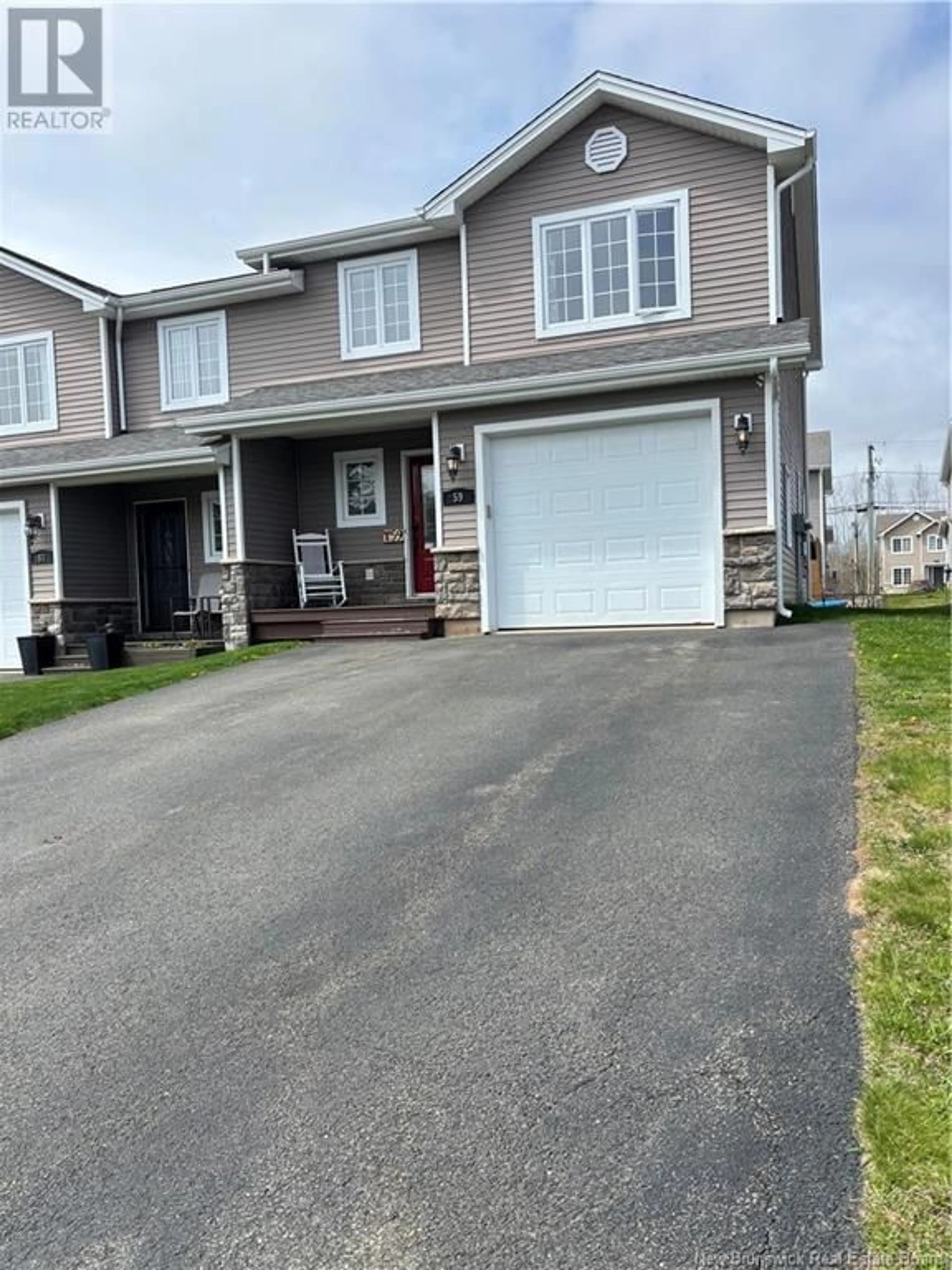 A pic from outside/outdoor area/front of a property/back of a property/a pic from drone, street for 59 LIONEL STREET, Dieppe New Brunswick E1A9C2