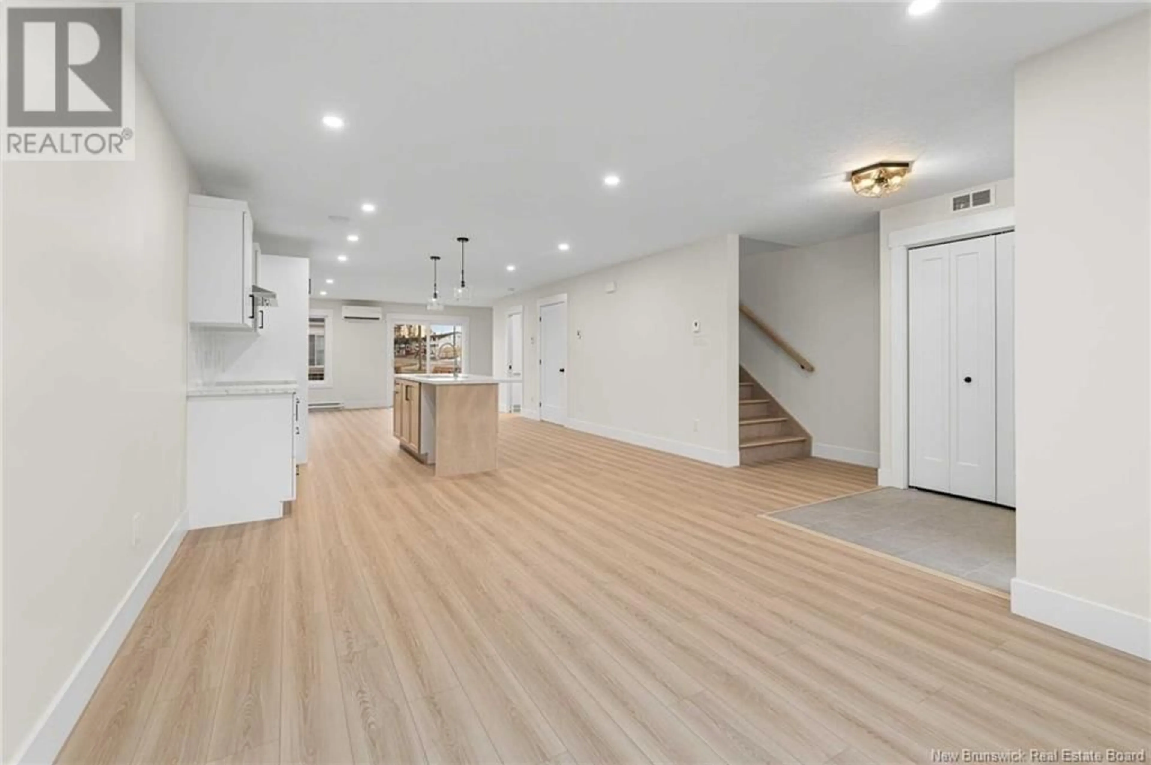 Open concept kitchen, wood/laminate floor for 108 ERNEST STREET, Dieppe New Brunswick E1A4T2