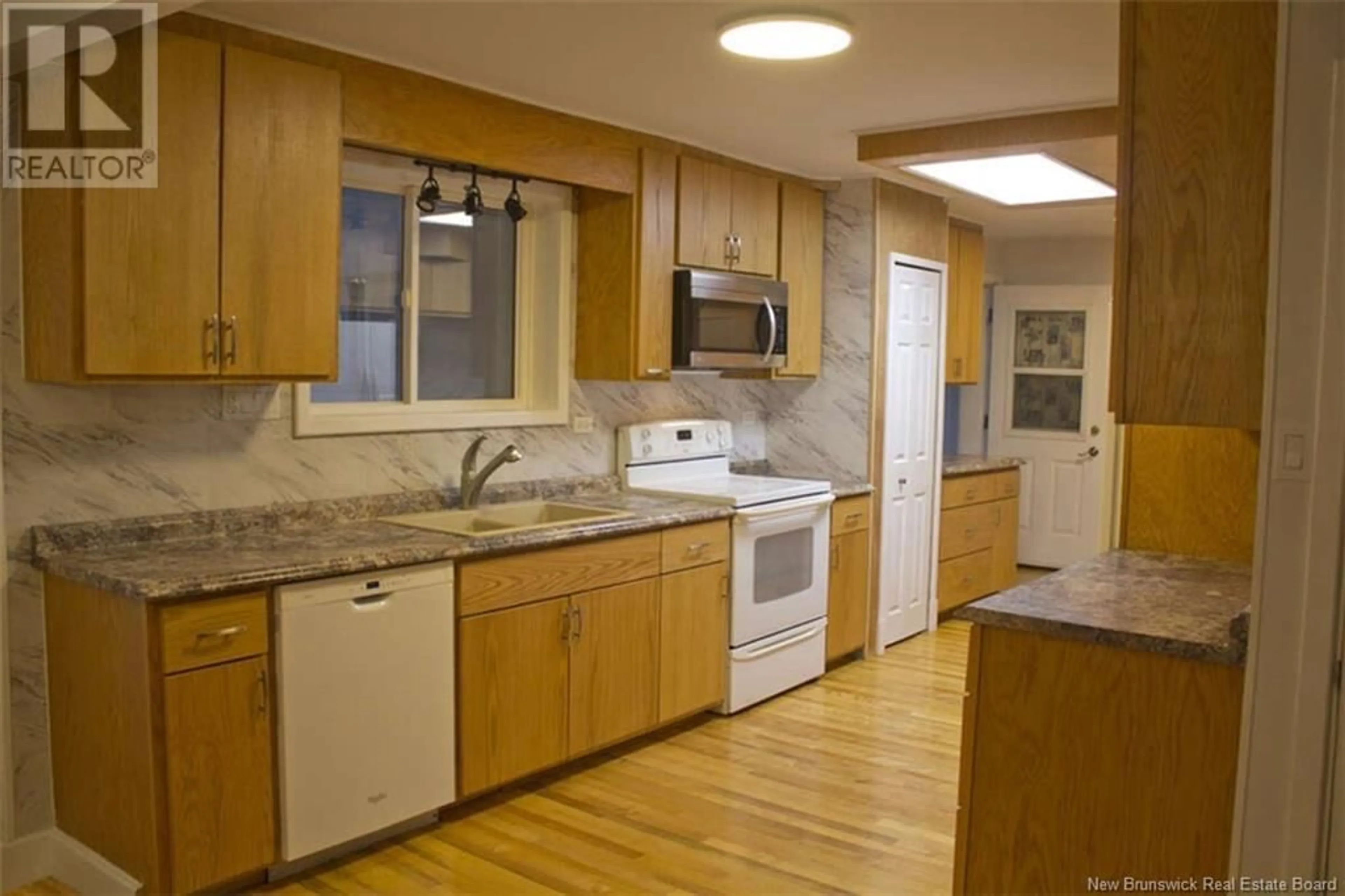Standard kitchen, wood/laminate floor for 8 - 6 HARBOUR STREET, Newcastle Creek New Brunswick E4B2K5
