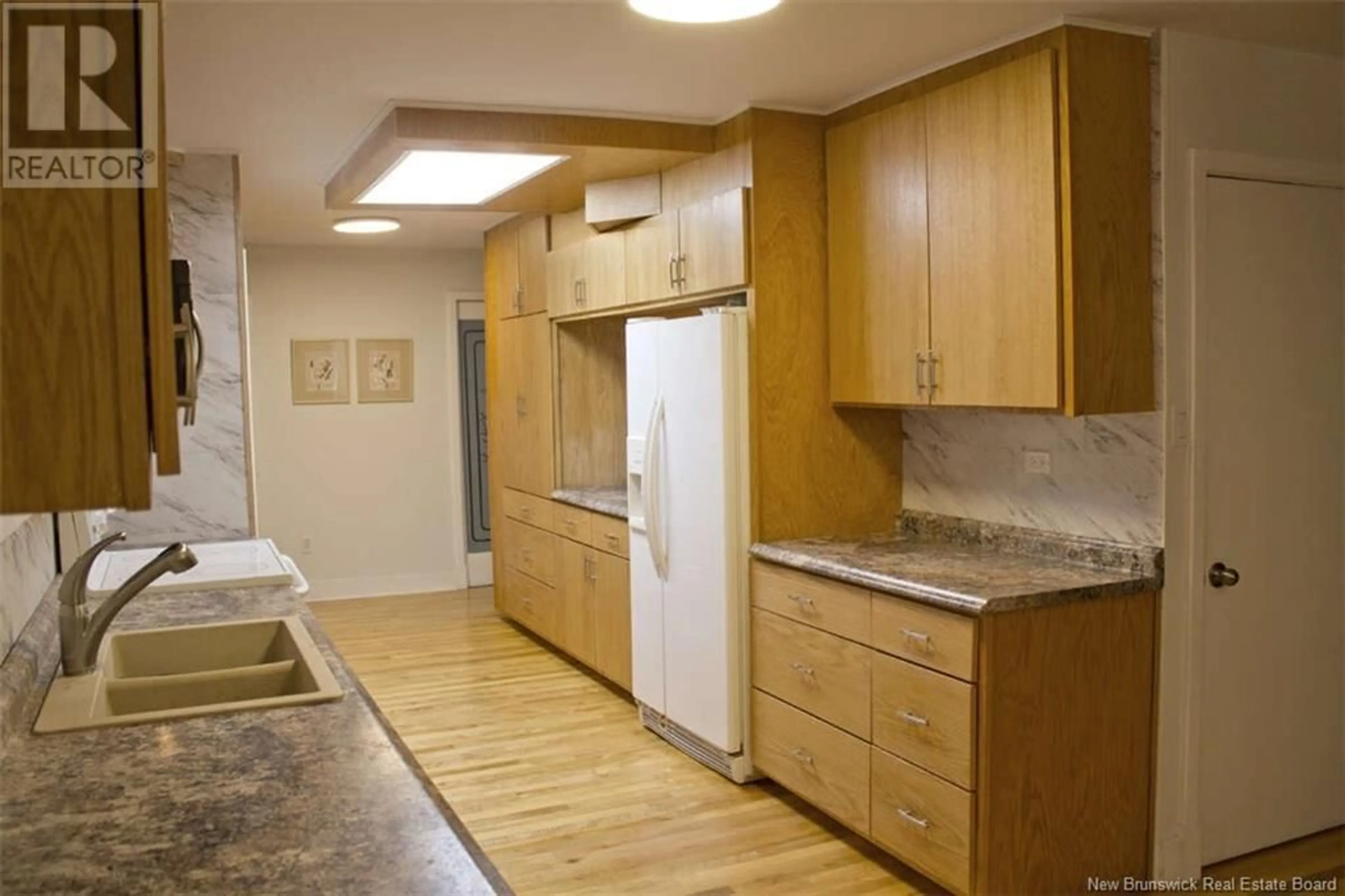 Standard kitchen, wood/laminate floor for 8 - 6 HARBOUR STREET, Newcastle Creek New Brunswick E4B2K5