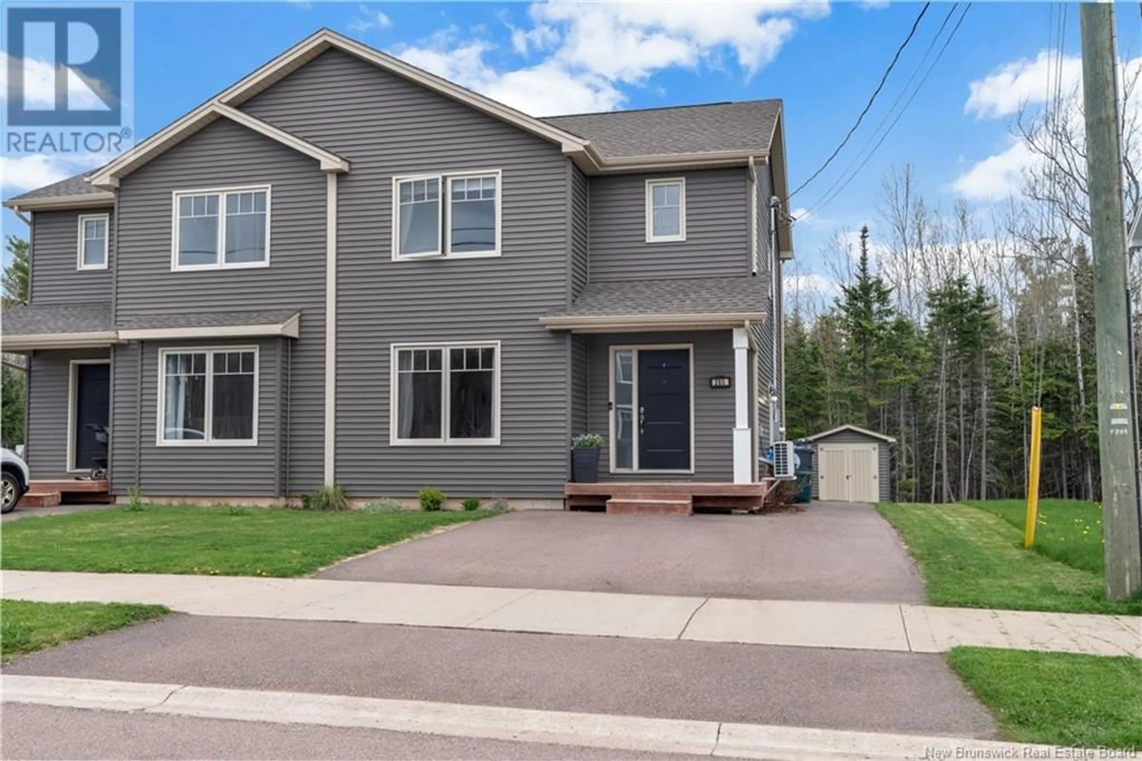 Home with vinyl exterior material, street for 285 O'NEILL STREET, Moncton New Brunswick E1A1X7