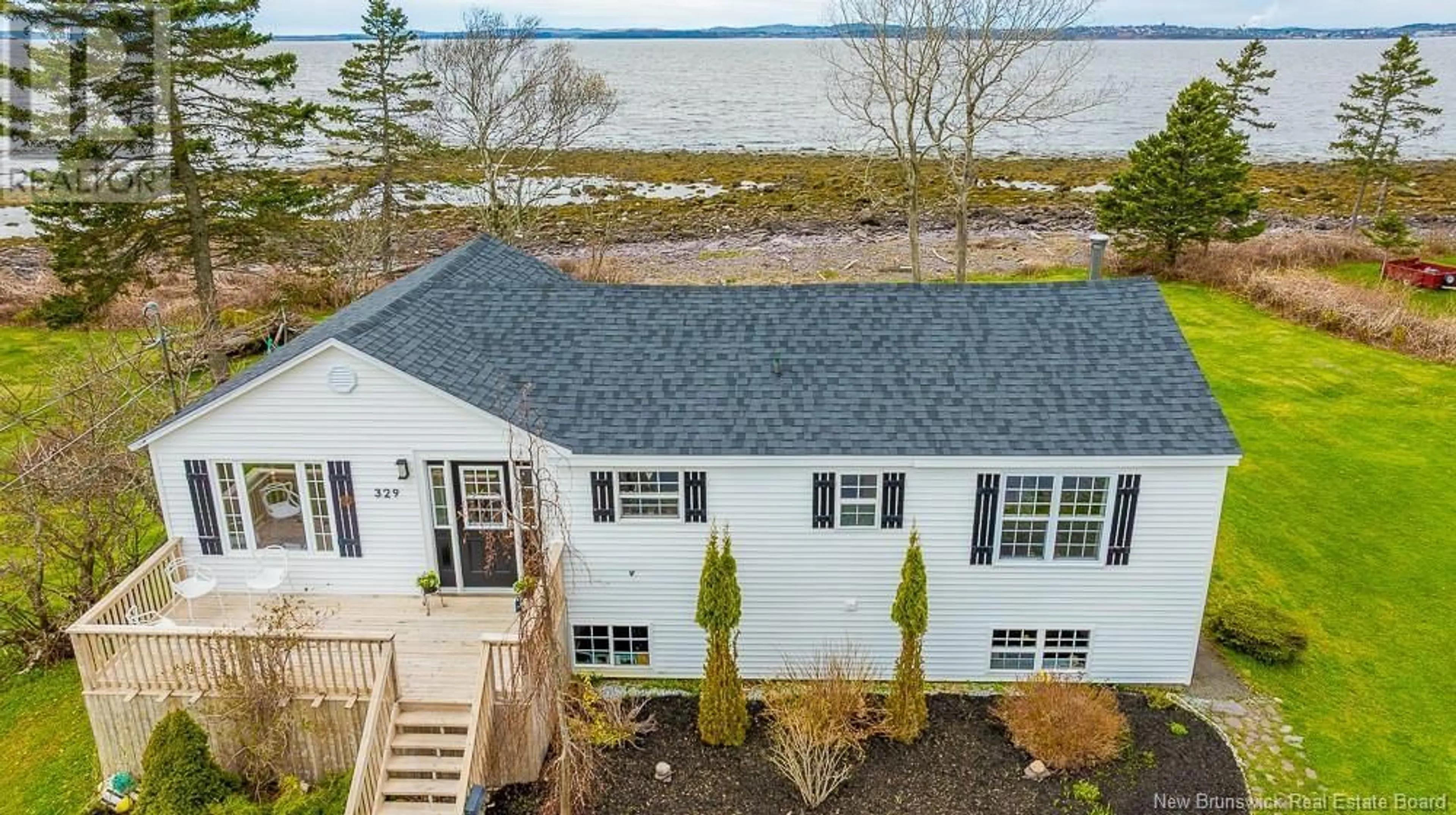 A pic from outside/outdoor area/front of a property/back of a property/a pic from drone, water/lake/river/ocean view for 329 ANTHONYS COVE ROAD, Saint John New Brunswick E2P1K9
