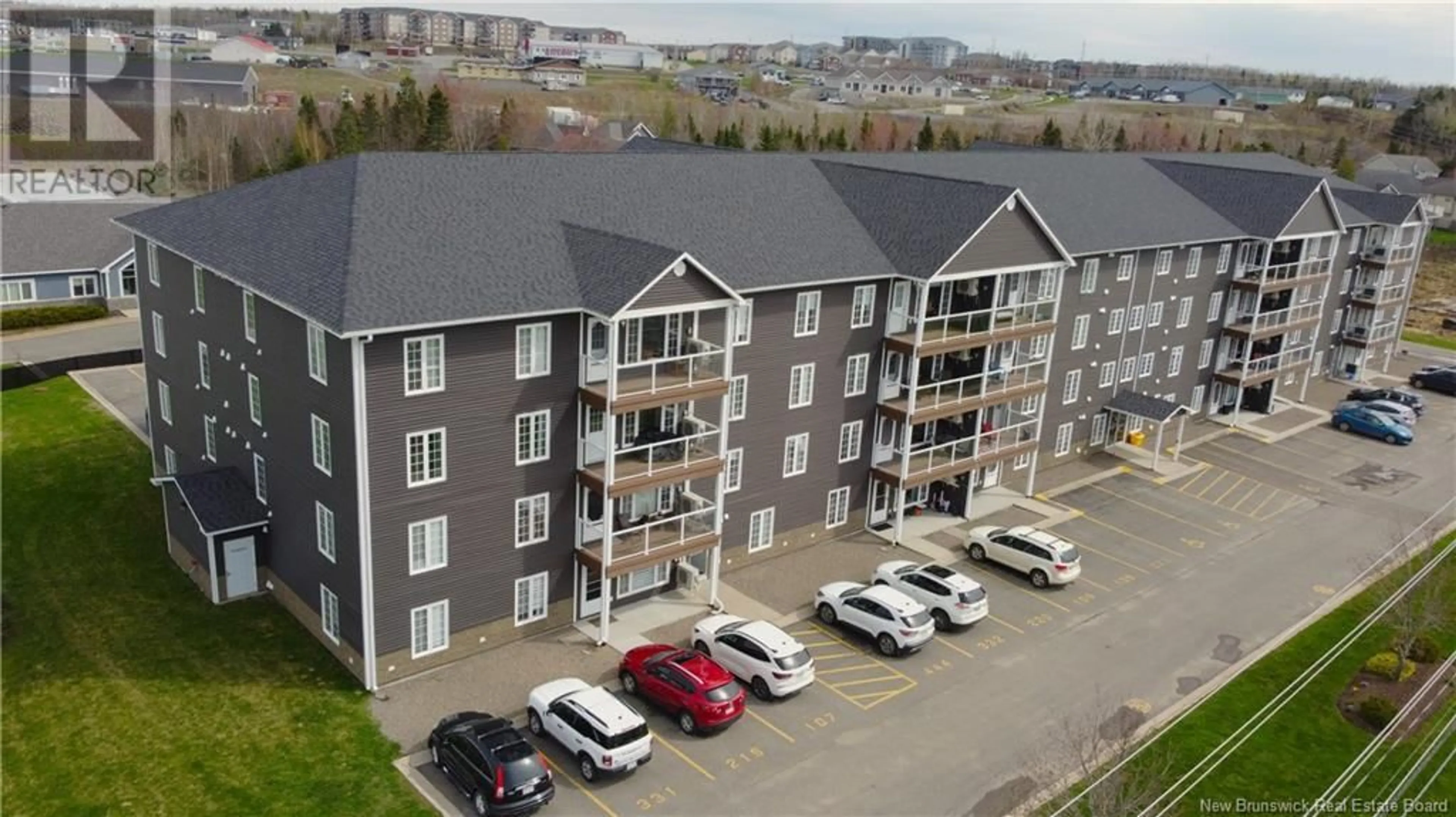 A pic from outside/outdoor area/front of a property/back of a property/a pic from drone, building for 331 - 225 SERENITY LANE, Fredericton New Brunswick E3B0H1