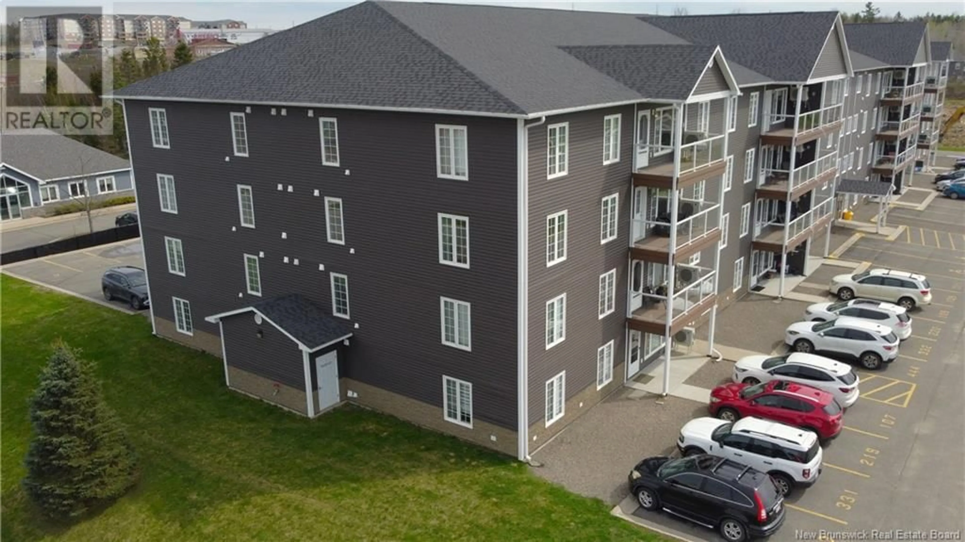 A pic from outside/outdoor area/front of a property/back of a property/a pic from drone, building for 331 - 225 SERENITY LANE, Fredericton New Brunswick E3B0H1