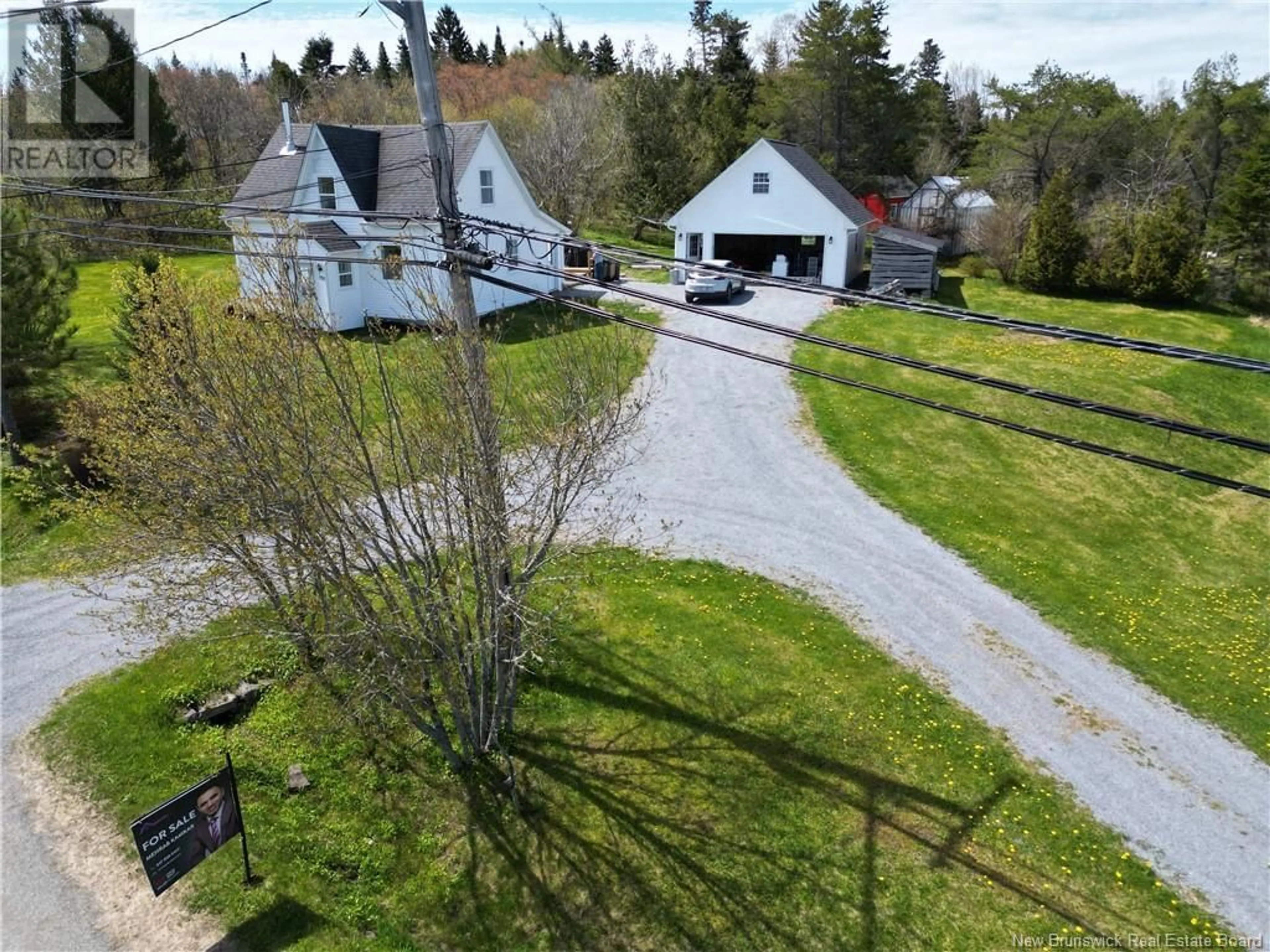 A pic from outside/outdoor area/front of a property/back of a property/a pic from drone, street for 838 LORNEVILLE ROAD, Lorneville New Brunswick E2M7E6