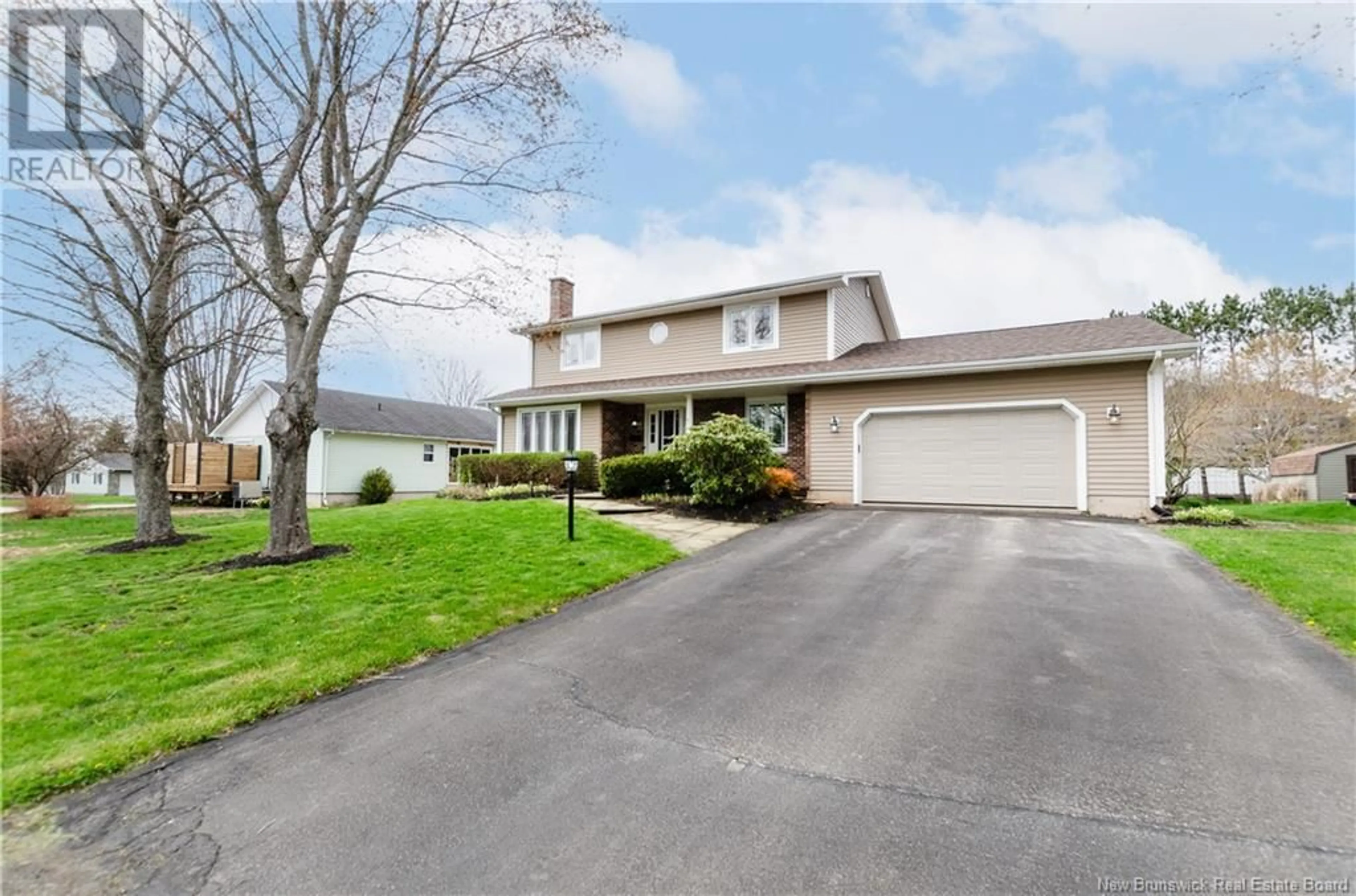 Home with vinyl exterior material, street for 588 LAFLEUR STREET, Dieppe New Brunswick E1A5V1