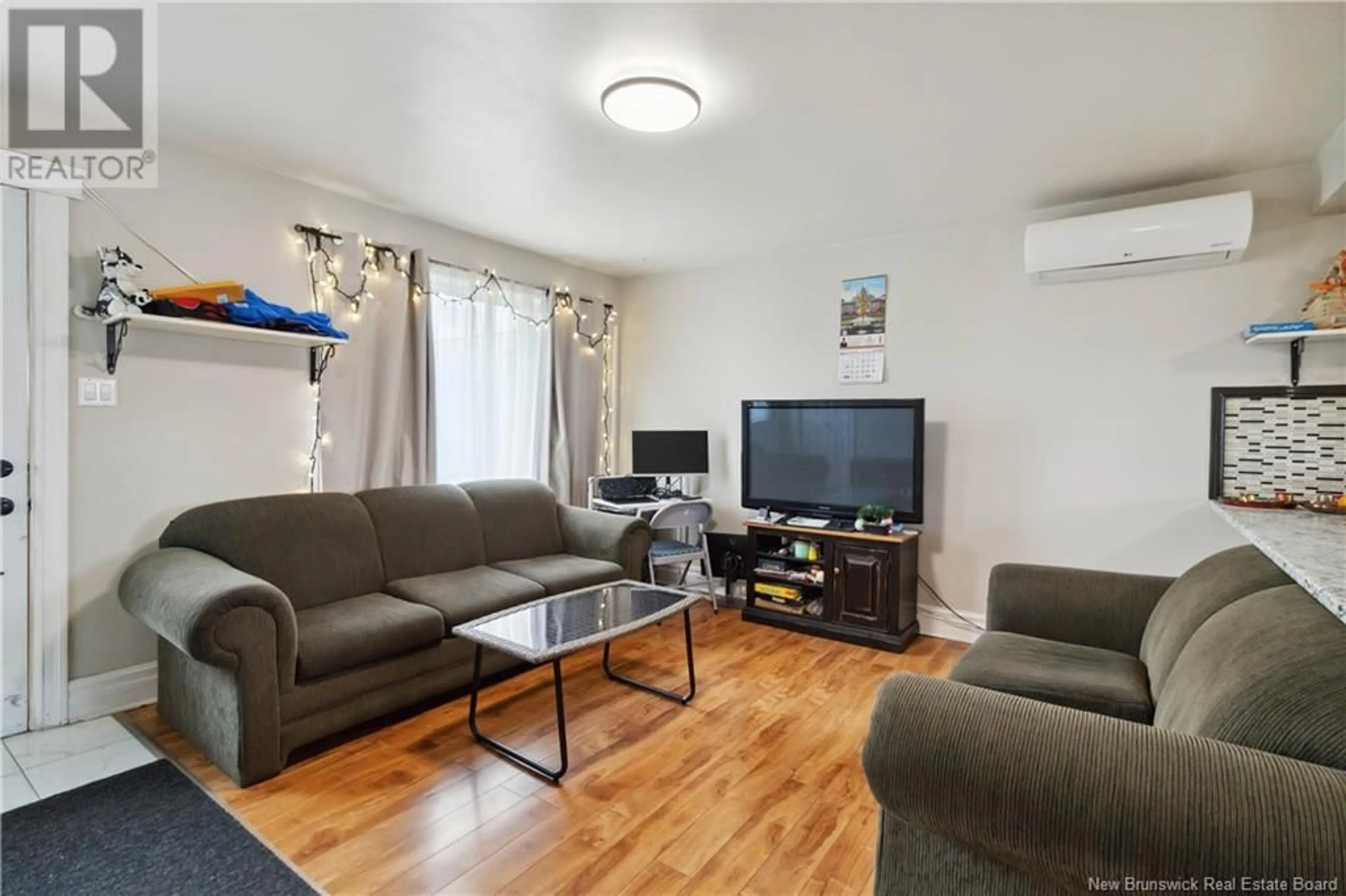 Living room with furniture, unknown for 13 WAVERLEY AVENUE, Moncton New Brunswick E1C7T4