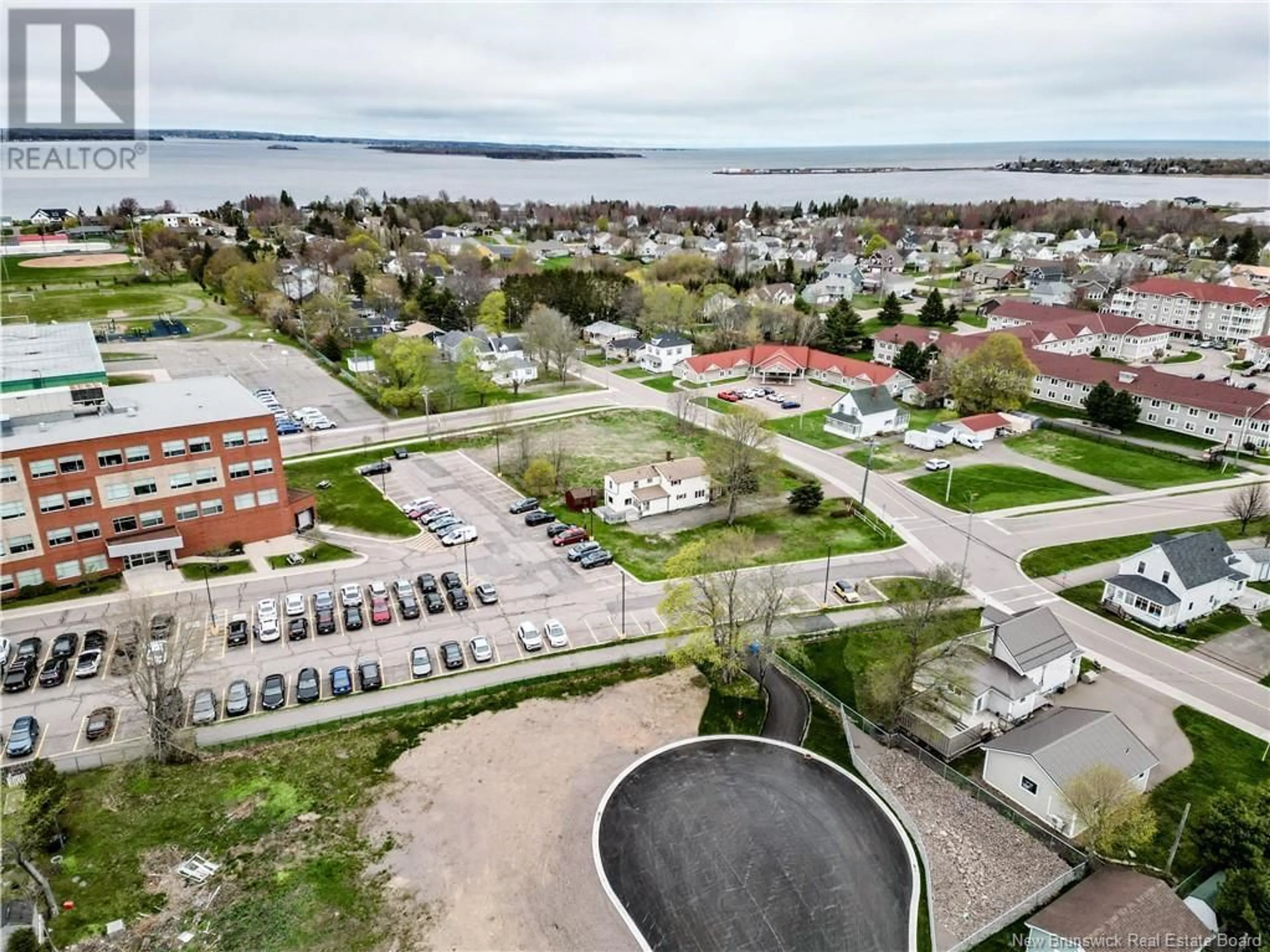 A pic from outside/outdoor area/front of a property/back of a property/a pic from drone, water/lake/river/ocean view for 47 GALLAGHER, Shediac New Brunswick E4P1S5