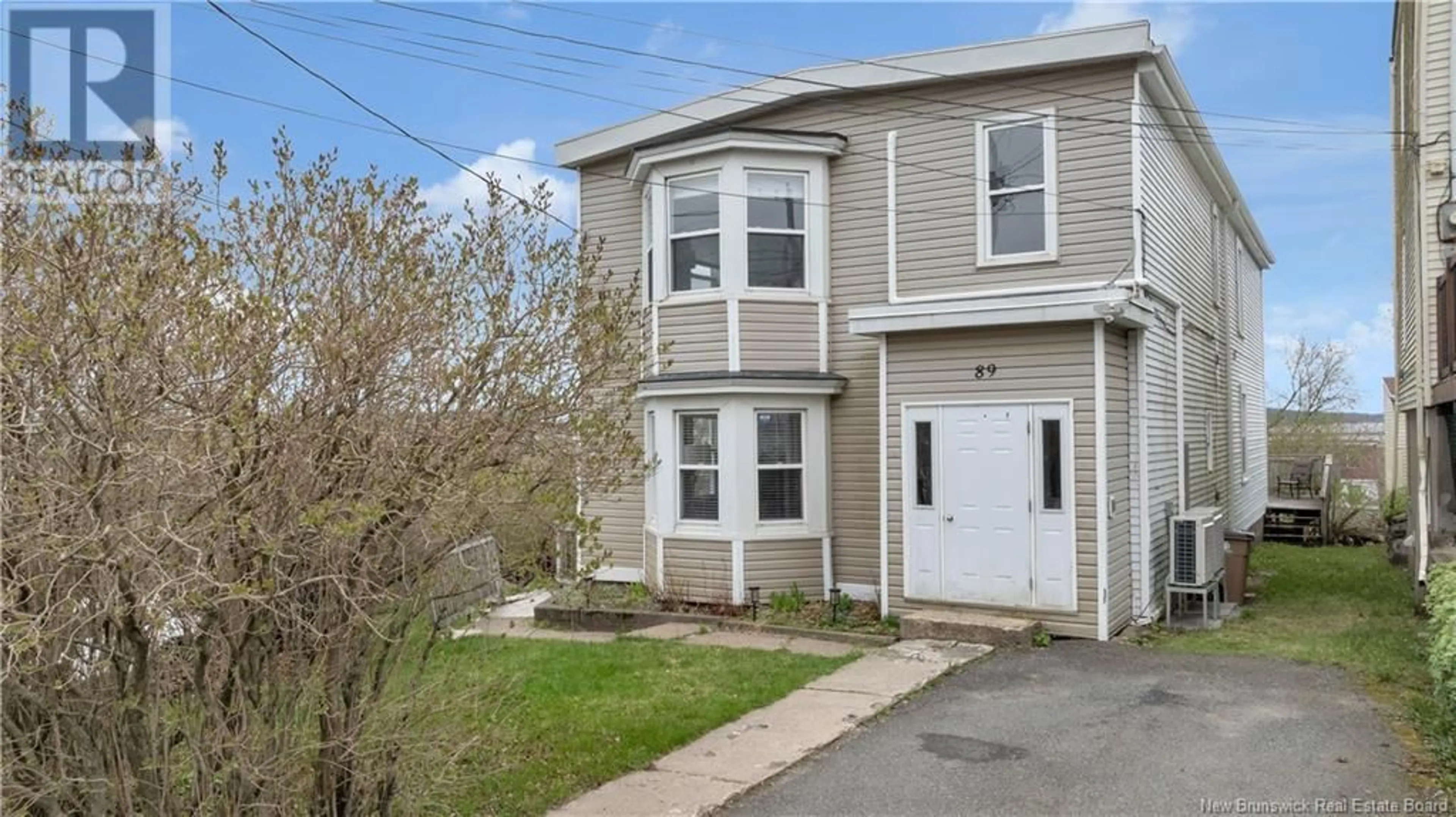 Home with vinyl exterior material, street for 89 SEELY STREET, Saint John New Brunswick E2K4B4