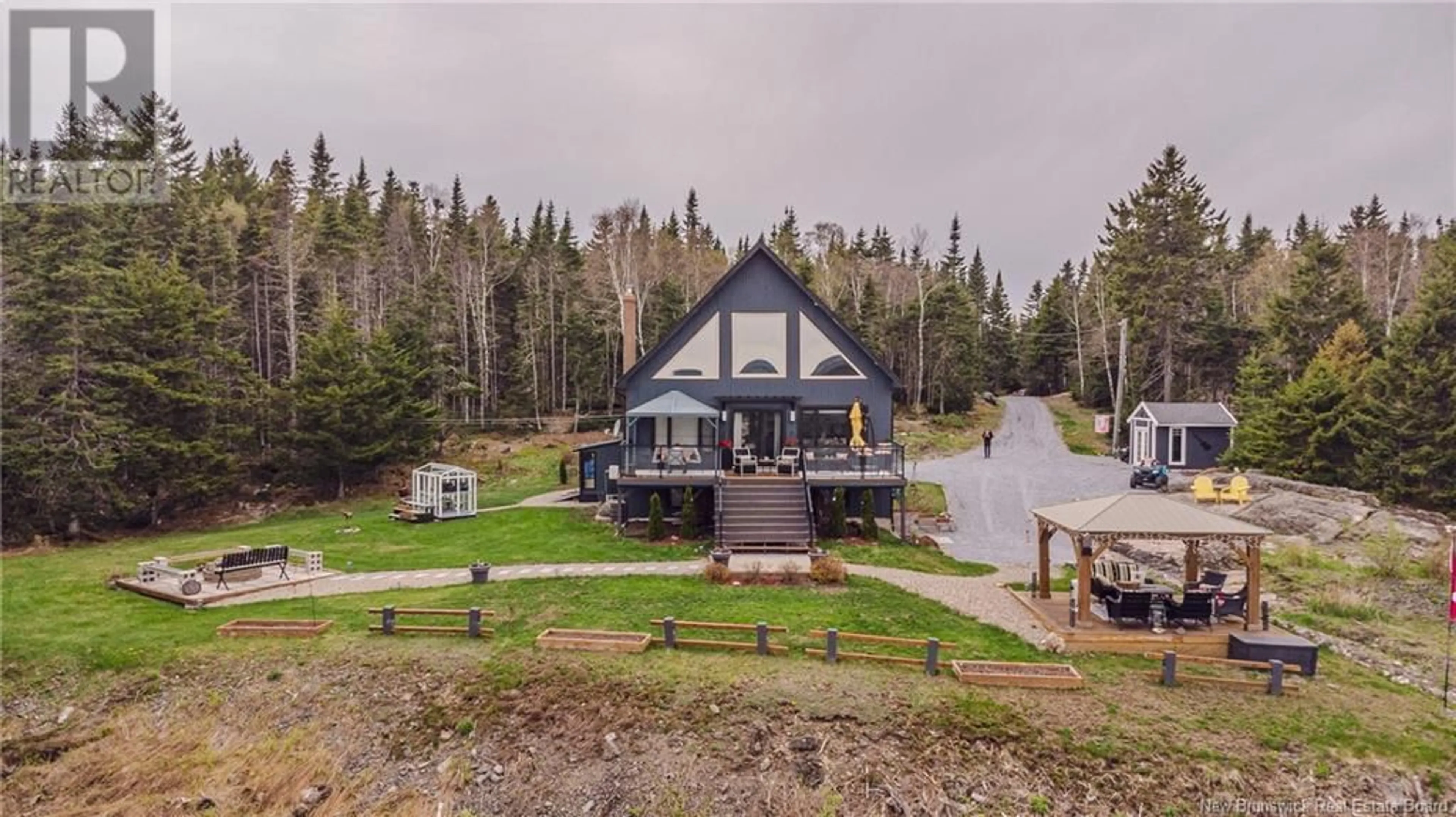 A pic from outside/outdoor area/front of a property/back of a property/a pic from drone, water/lake/river/ocean view for 82 PEACEFUL MOUNTAIN LANE, Clifton Royal New Brunswick E2S2N4