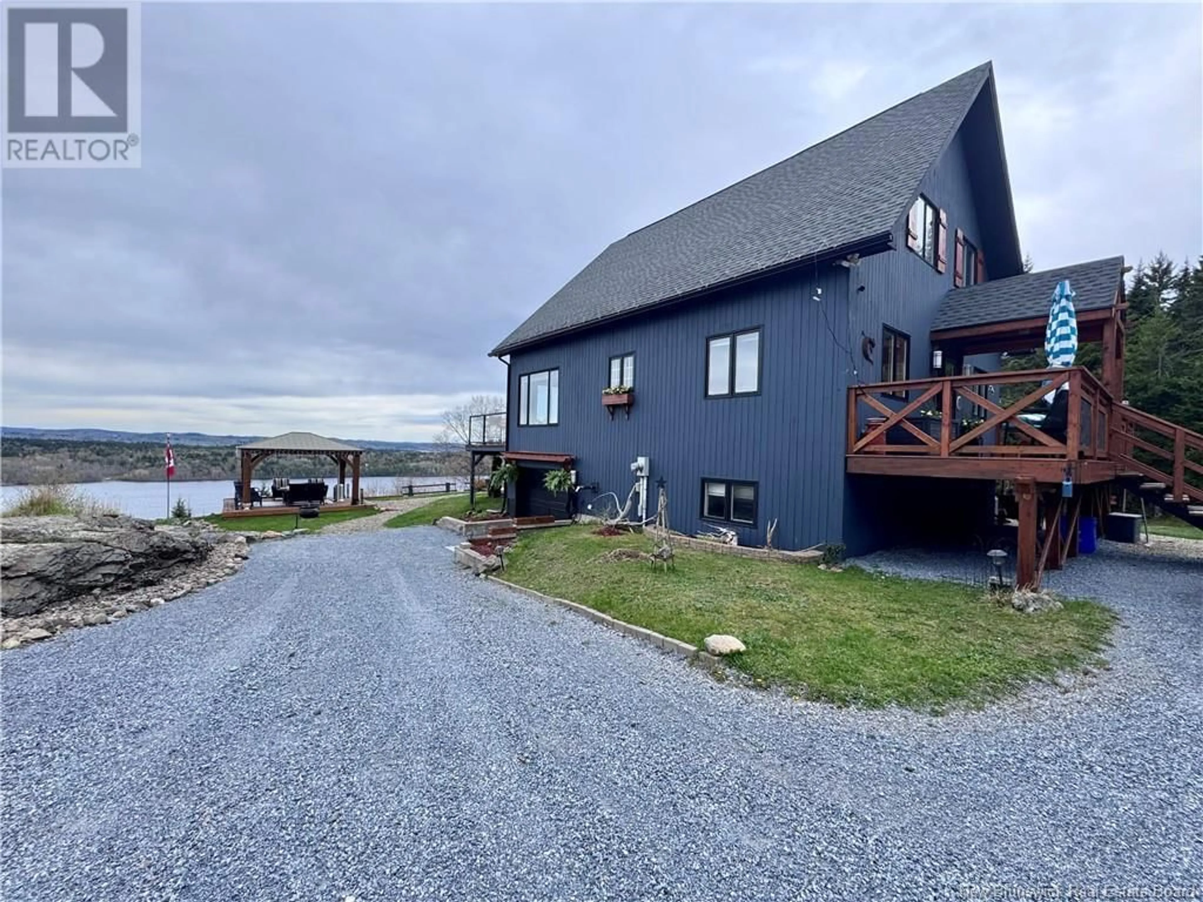 A pic from outside/outdoor area/front of a property/back of a property/a pic from drone, water/lake/river/ocean view for 82 PEACEFUL MOUNTAIN LANE, Clifton Royal New Brunswick E2S2N4