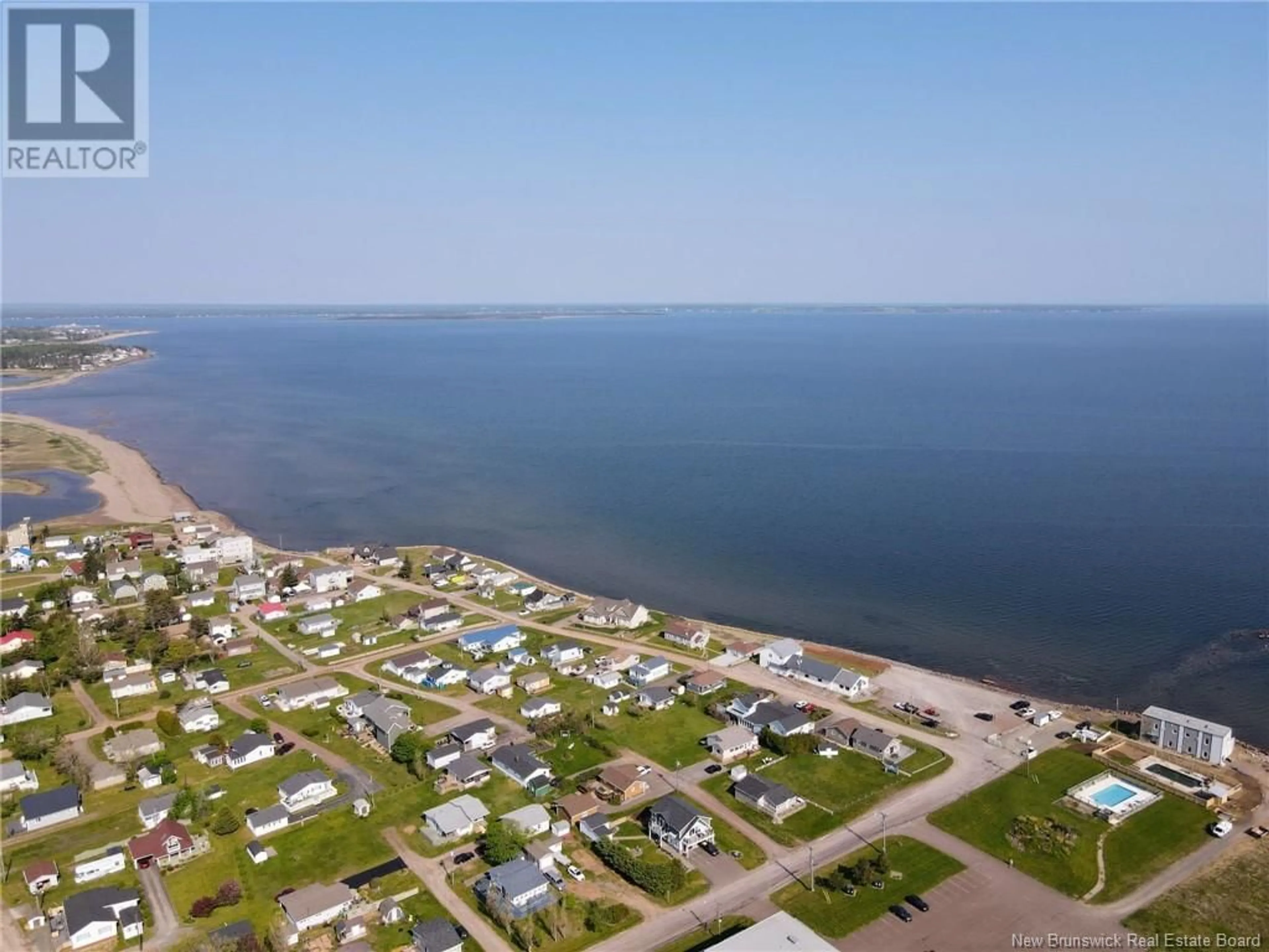 A pic from outside/outdoor area/front of a property/back of a property/a pic from drone, water/lake/river/ocean view for 216 - 69 CAP BIMET BOULEVARD, Beaubassin East New Brunswick E4P6X5