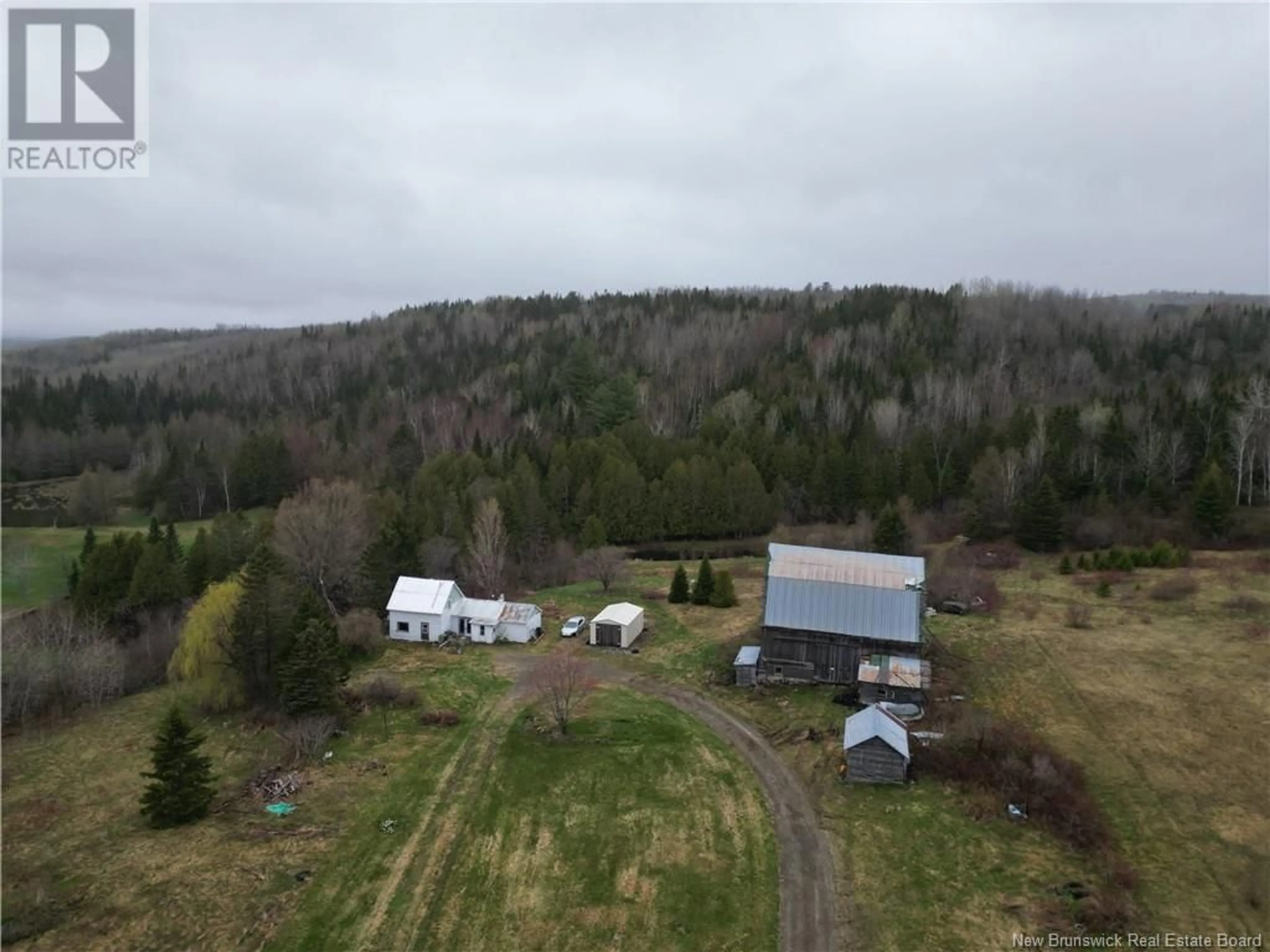 A pic from outside/outdoor area/front of a property/back of a property/a pic from drone, forest/trees view for 219 CHURCHLAND ROAD, Tilley New Brunswick E7H1S7