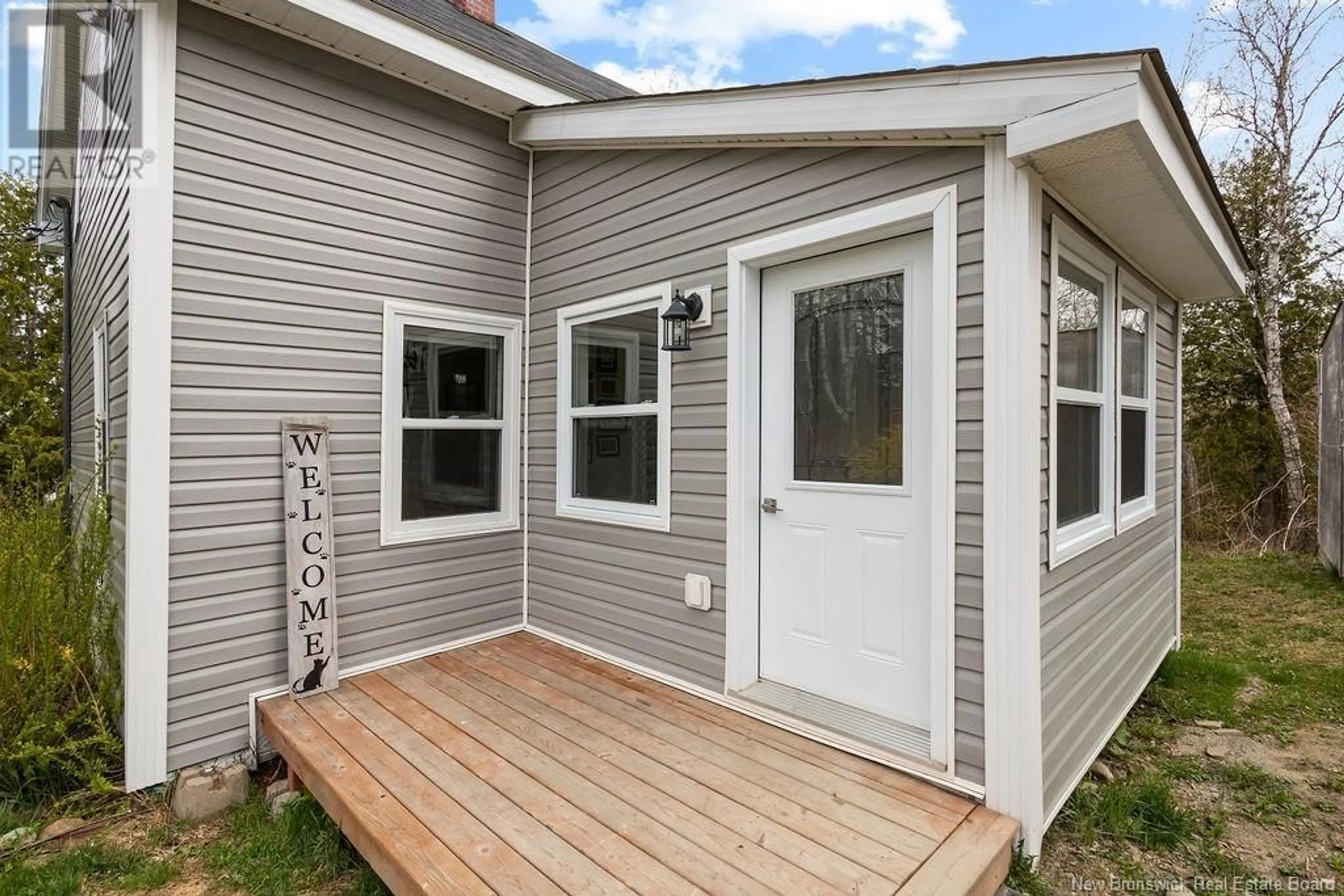 Home with vinyl exterior material, street for 22 ISLANDVIEW DRIVE, Miramichi New Brunswick E1N6B3