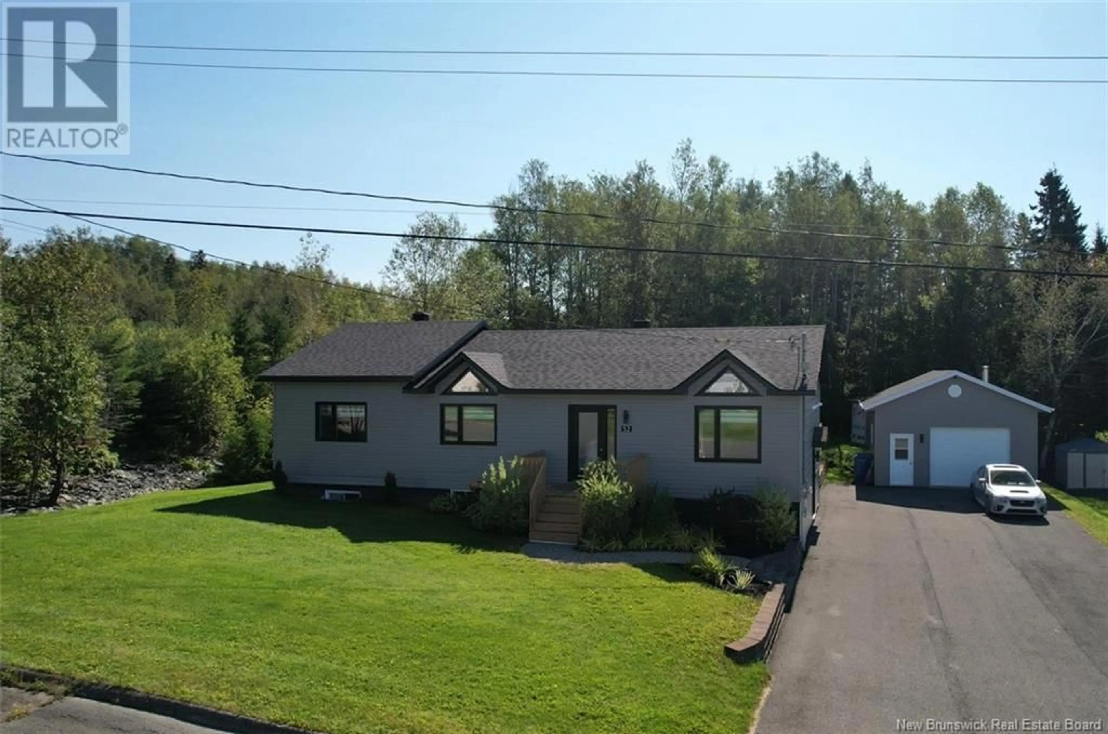 A pic from outside/outdoor area/front of a property/back of a property/a pic from drone, street for 52 DU RÉSERVOIR STREET, Saint-Jacques New Brunswick E7B2X2