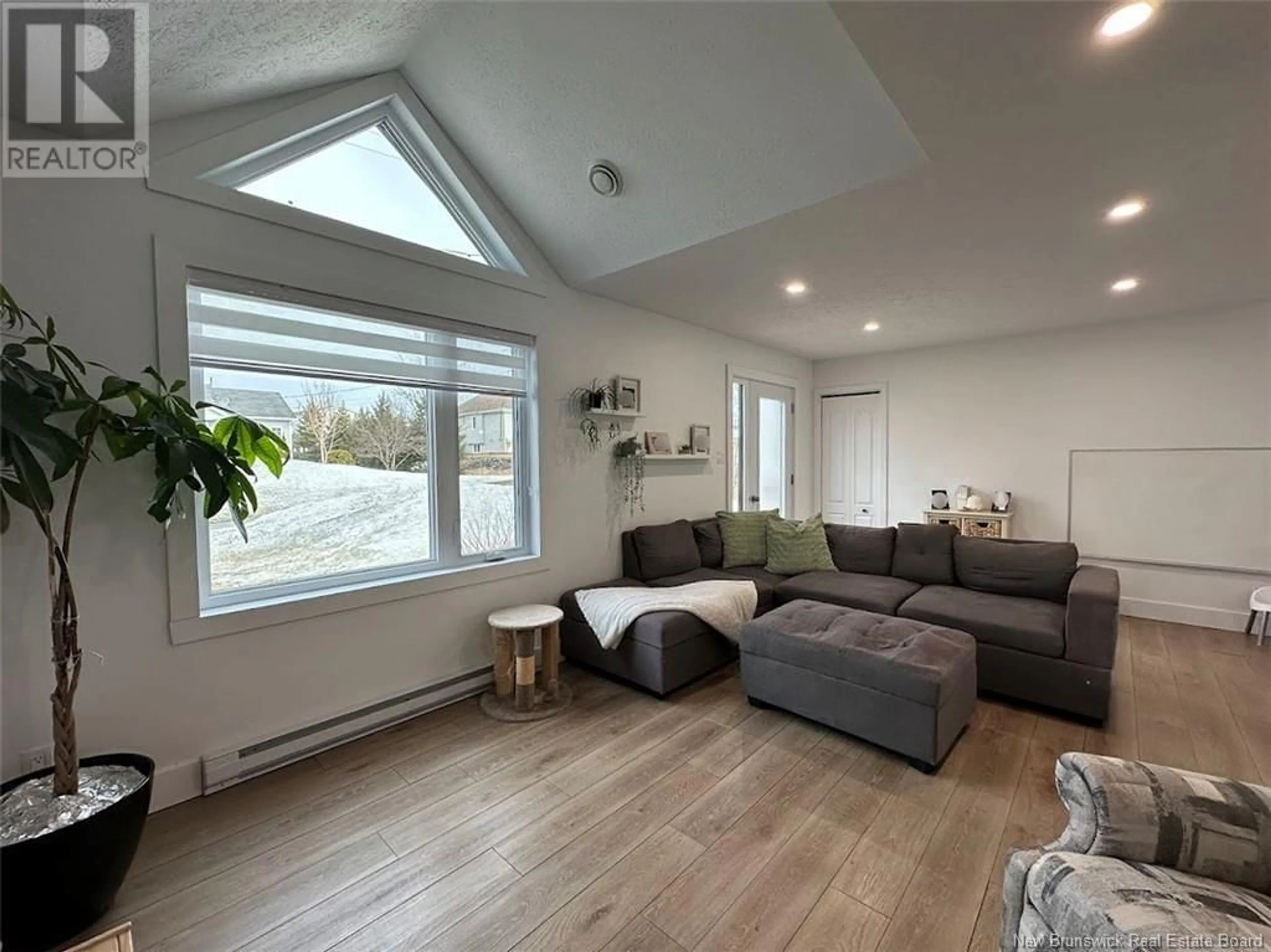Living room with furniture, wood/laminate floor for 52 DU RÉSERVOIR STREET, Saint-Jacques New Brunswick E7B2X2