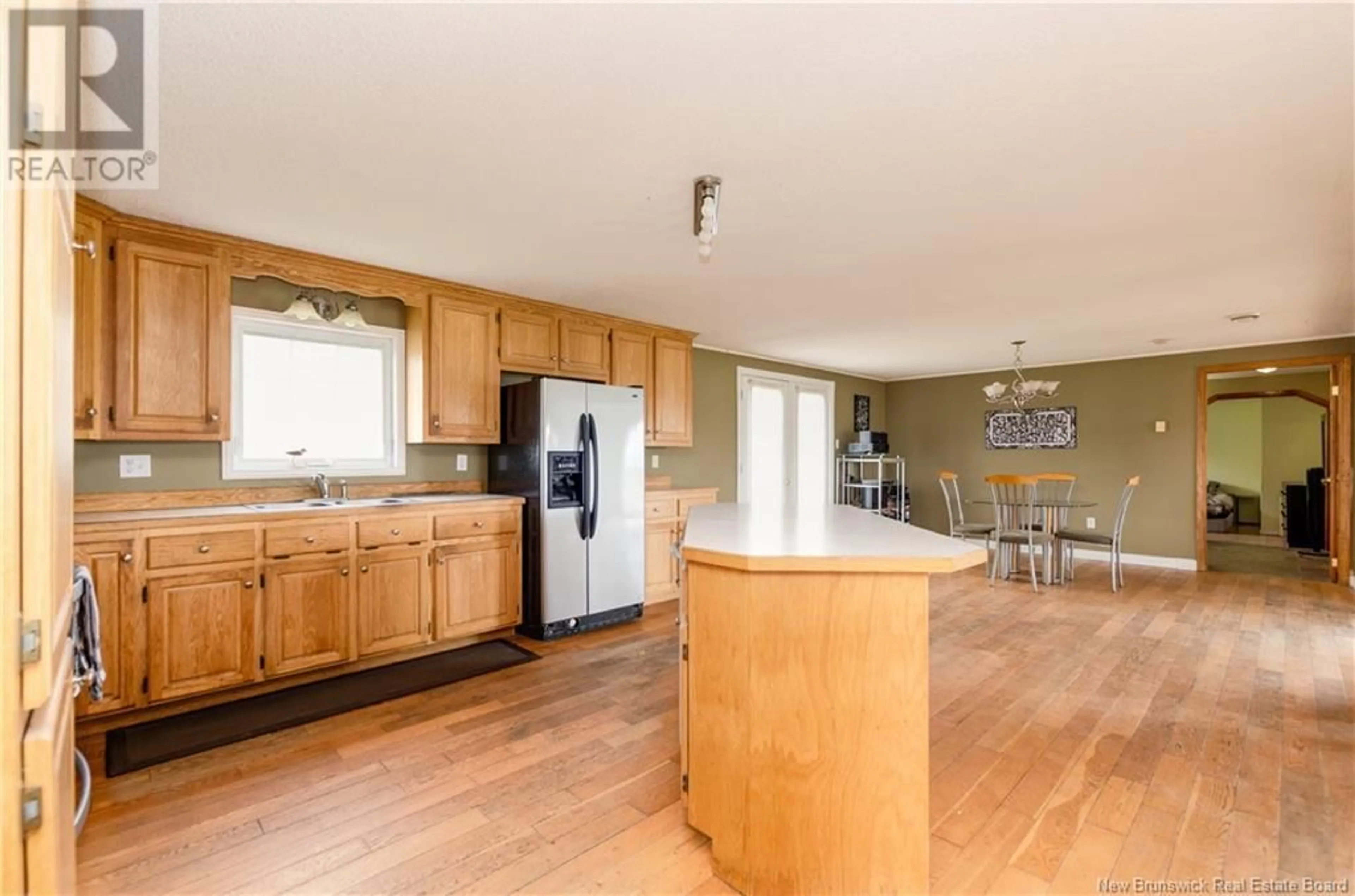 Open concept kitchen, wood/laminate floor for 43 GOLF CLUB ROAD, Hillsborough New Brunswick E4H2T7