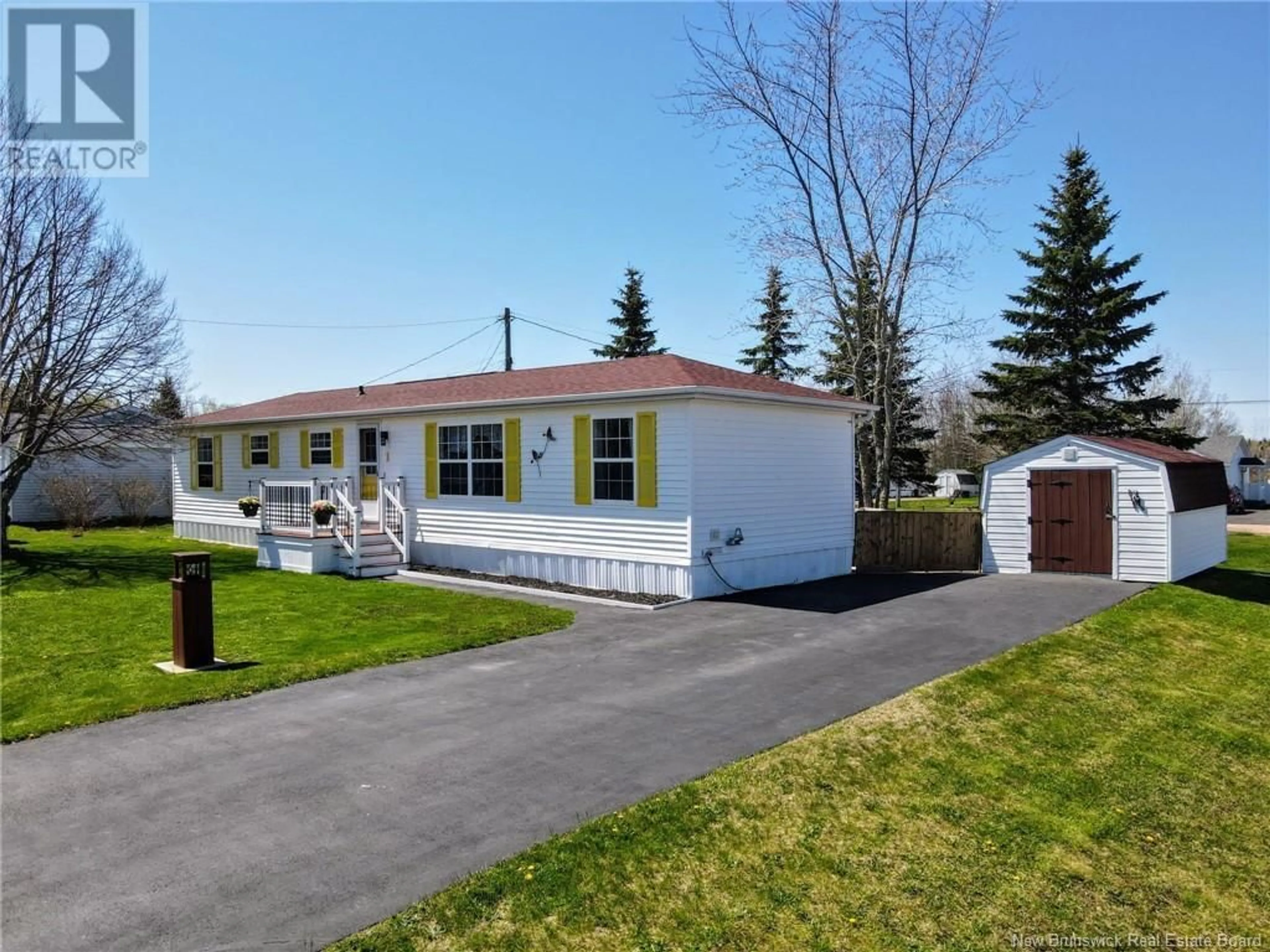 Home with vinyl exterior material, street for 1 JASPER STREET, Moncton New Brunswick E1H2X6