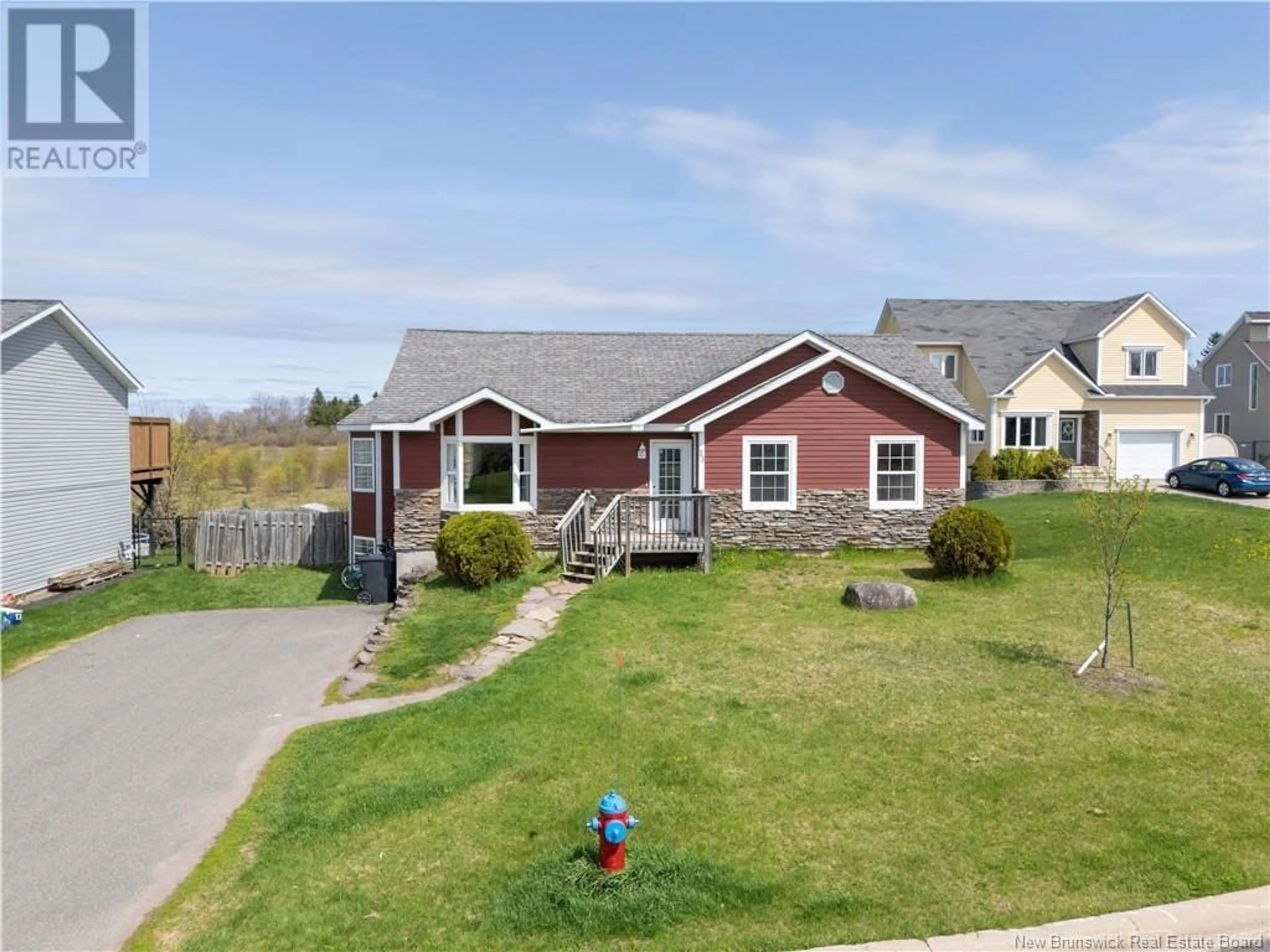 A pic from outside/outdoor area/front of a property/back of a property/a pic from drone, street for 33 HALLIHAN DRIVE, Oromocto New Brunswick E2V0C2