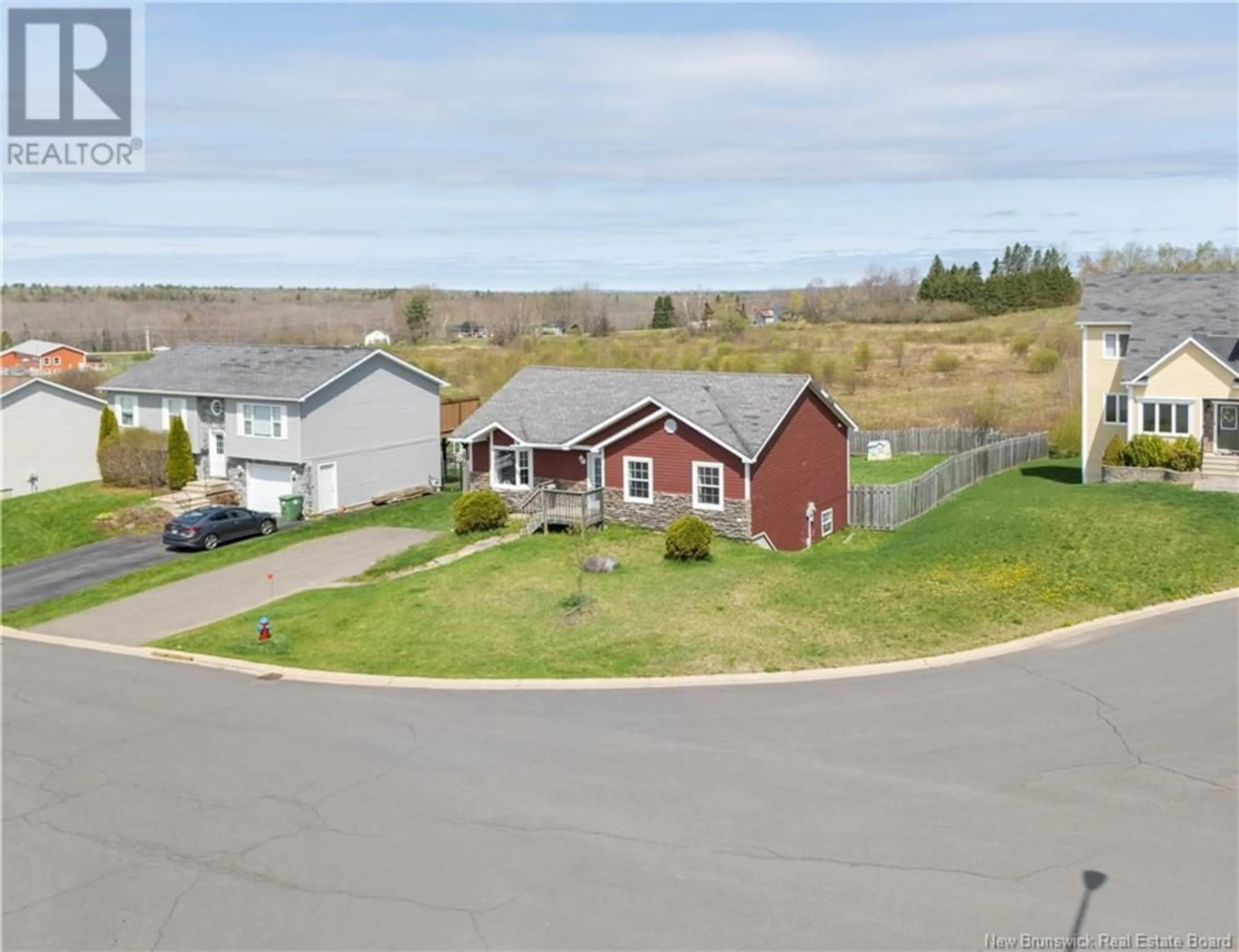 A pic from outside/outdoor area/front of a property/back of a property/a pic from drone, unknown for 33 HALLIHAN DRIVE, Oromocto New Brunswick E2V0C2