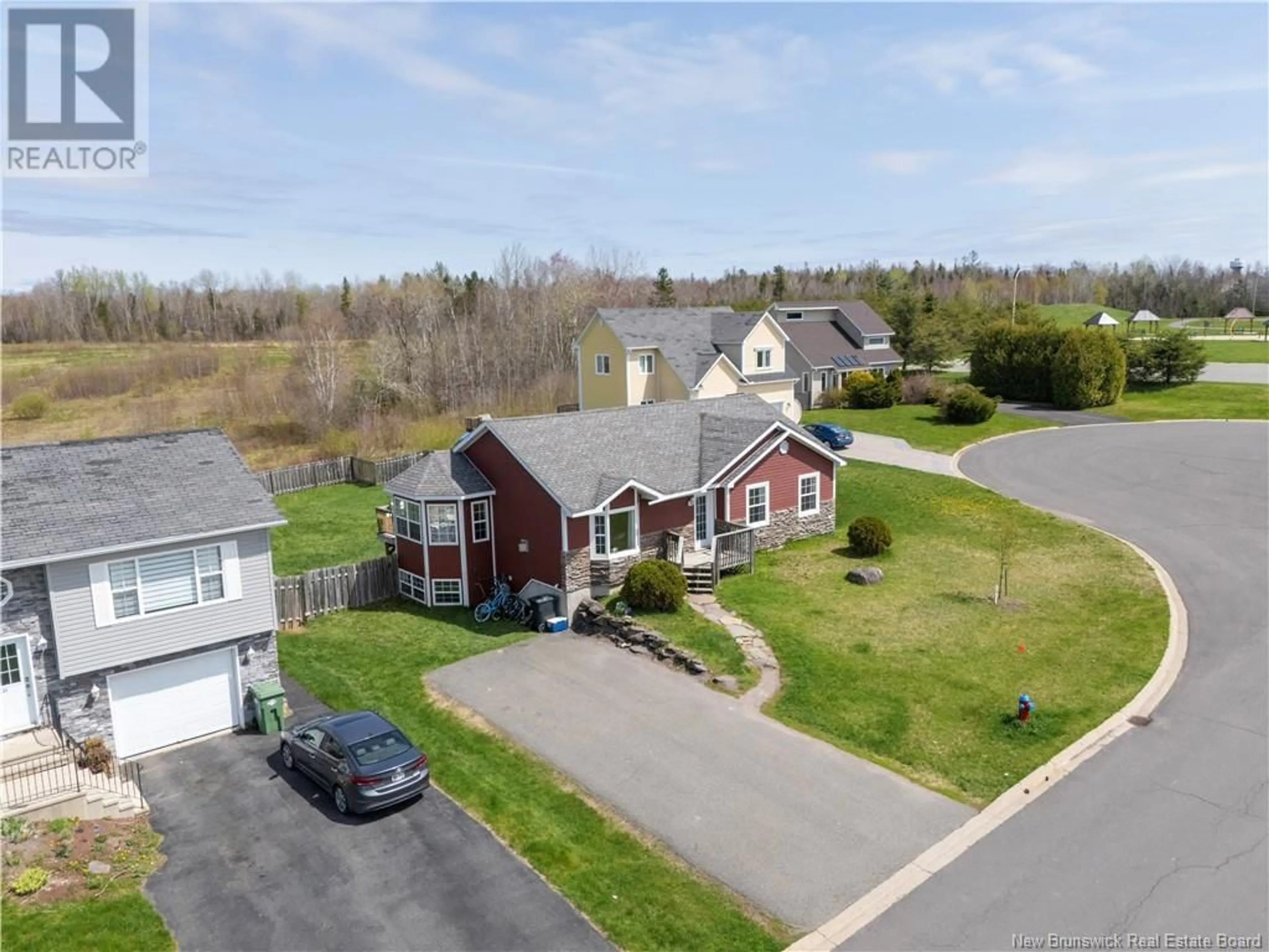 A pic from outside/outdoor area/front of a property/back of a property/a pic from drone, street for 33 HALLIHAN DRIVE, Oromocto New Brunswick E2V0C2