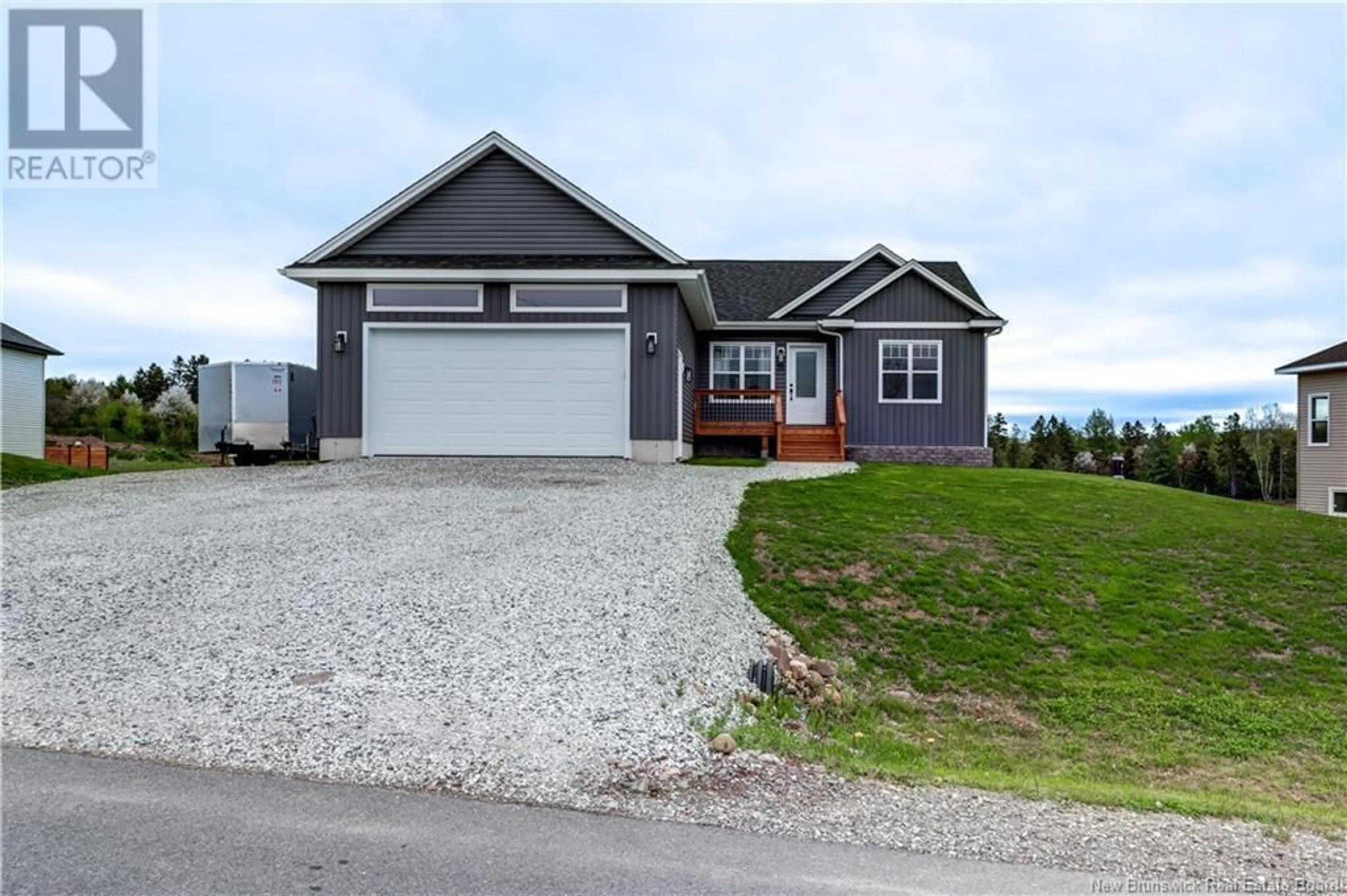 Home with vinyl exterior material, street for 35 APPLE BLOSSOM TRAIL, Hampton New Brunswick E5N0L8
