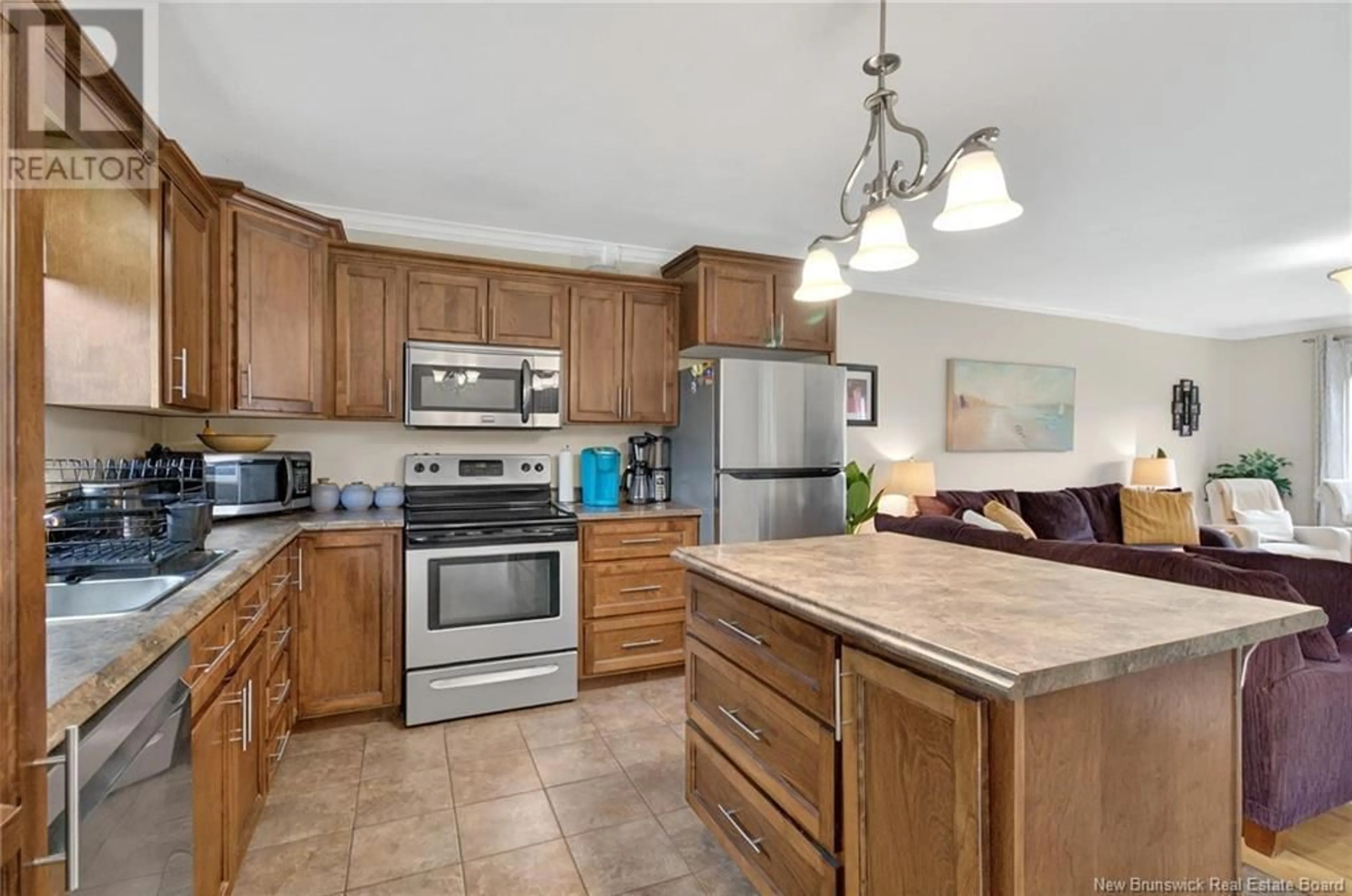 Open concept kitchen, ceramic/tile floor for 4 MOSSYOAK CRESCENT, Moncton New Brunswick E1G0J7