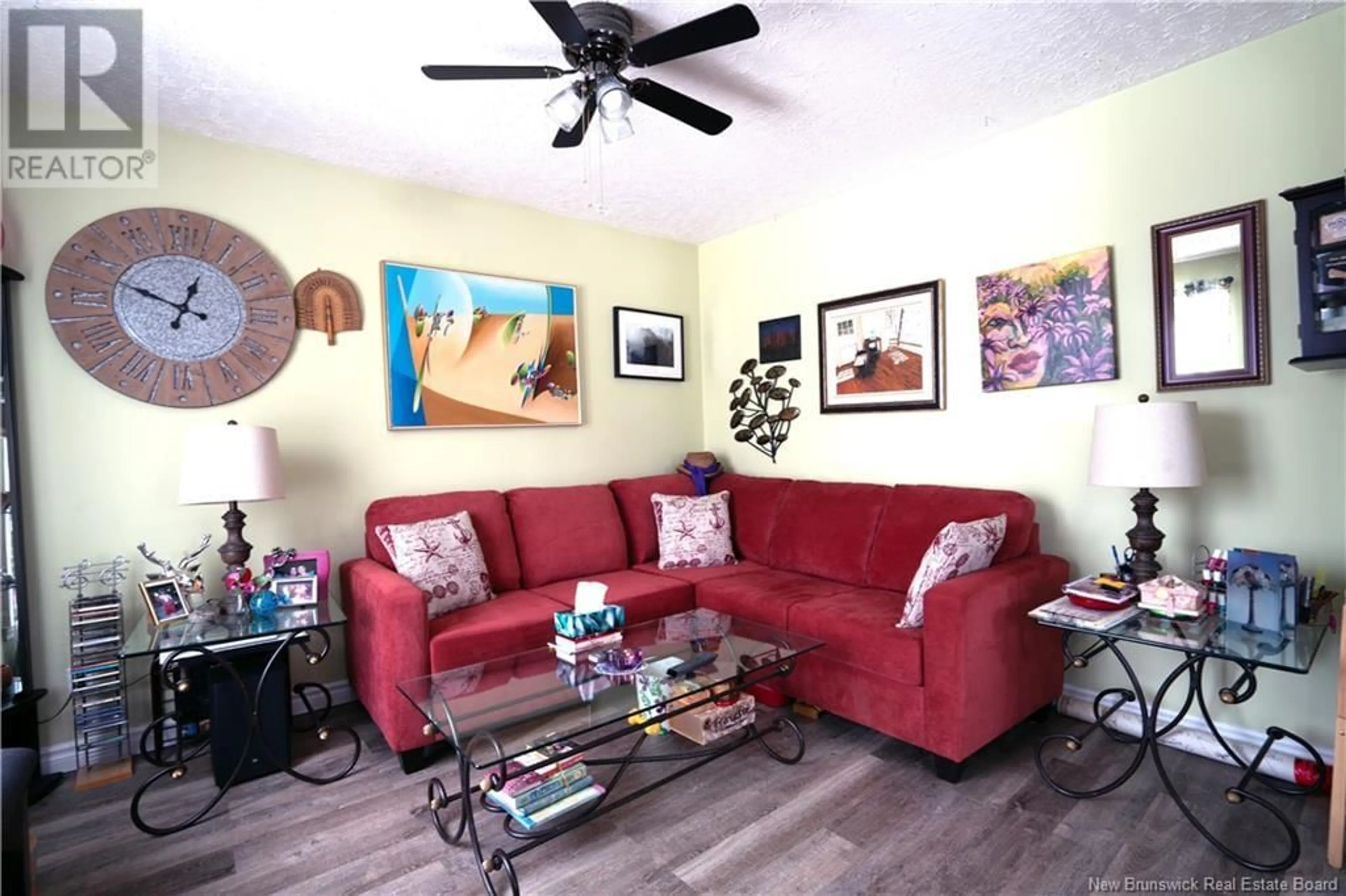 Living room with furniture, wood/laminate floor for 7261 17 ROUTE, Kedgwick New Brunswick E8B1W4