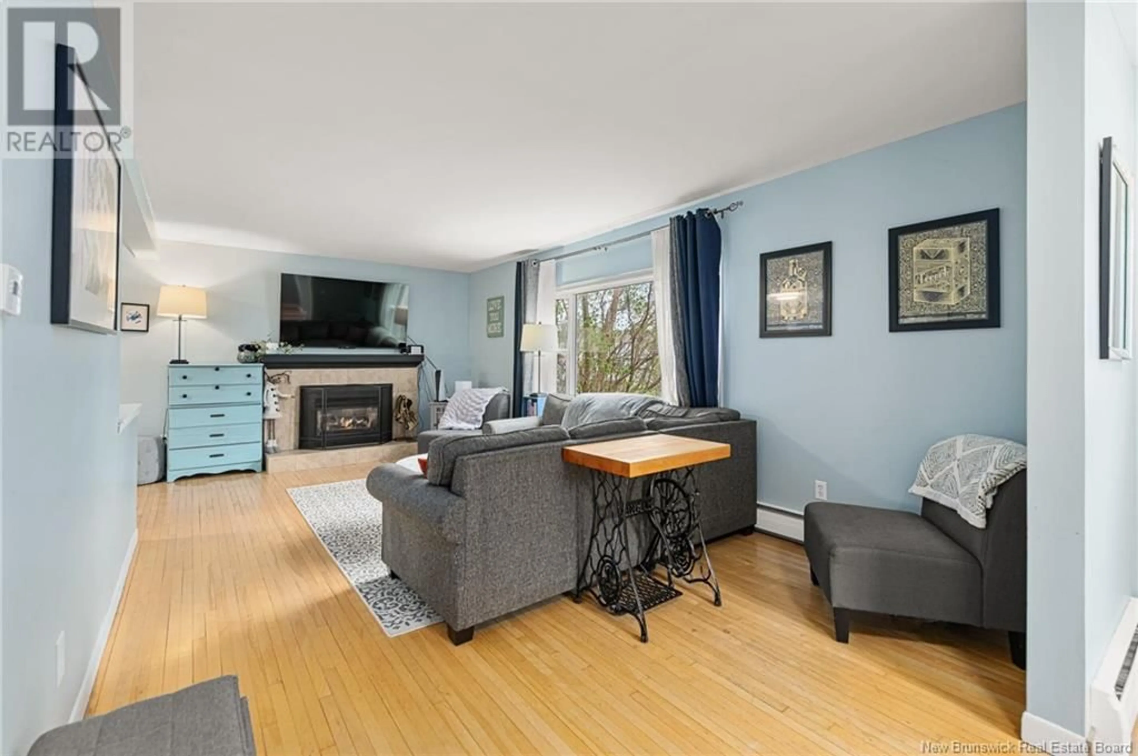Living room with furniture, wood/laminate floor for 716 BLYTHWOOD AVENUE, Riverview New Brunswick E1B2H6