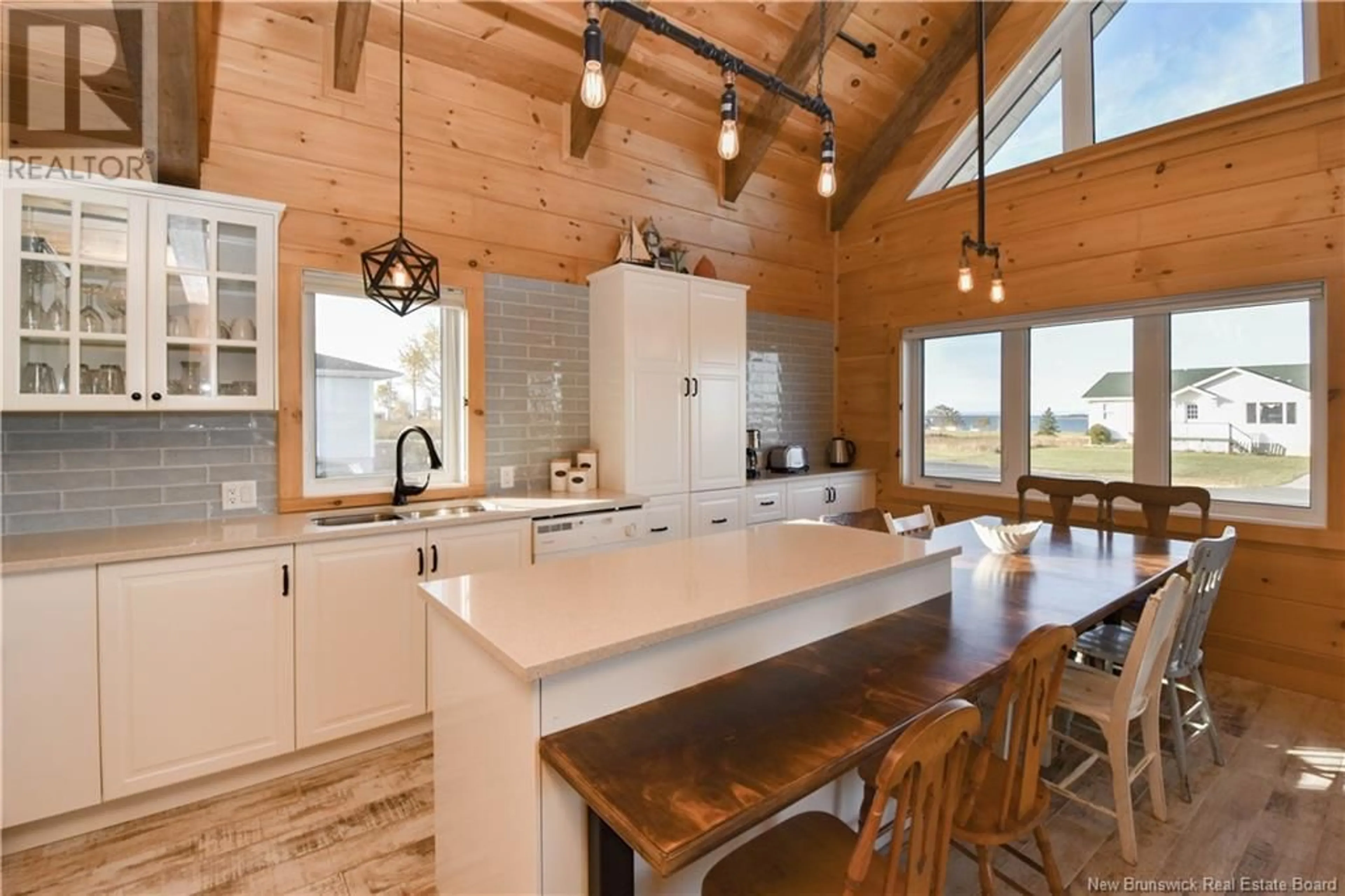 Open concept kitchen, wood/laminate floor for 362 RUE DE L'ILE STREET, Caraquet New Brunswick E1W1B5