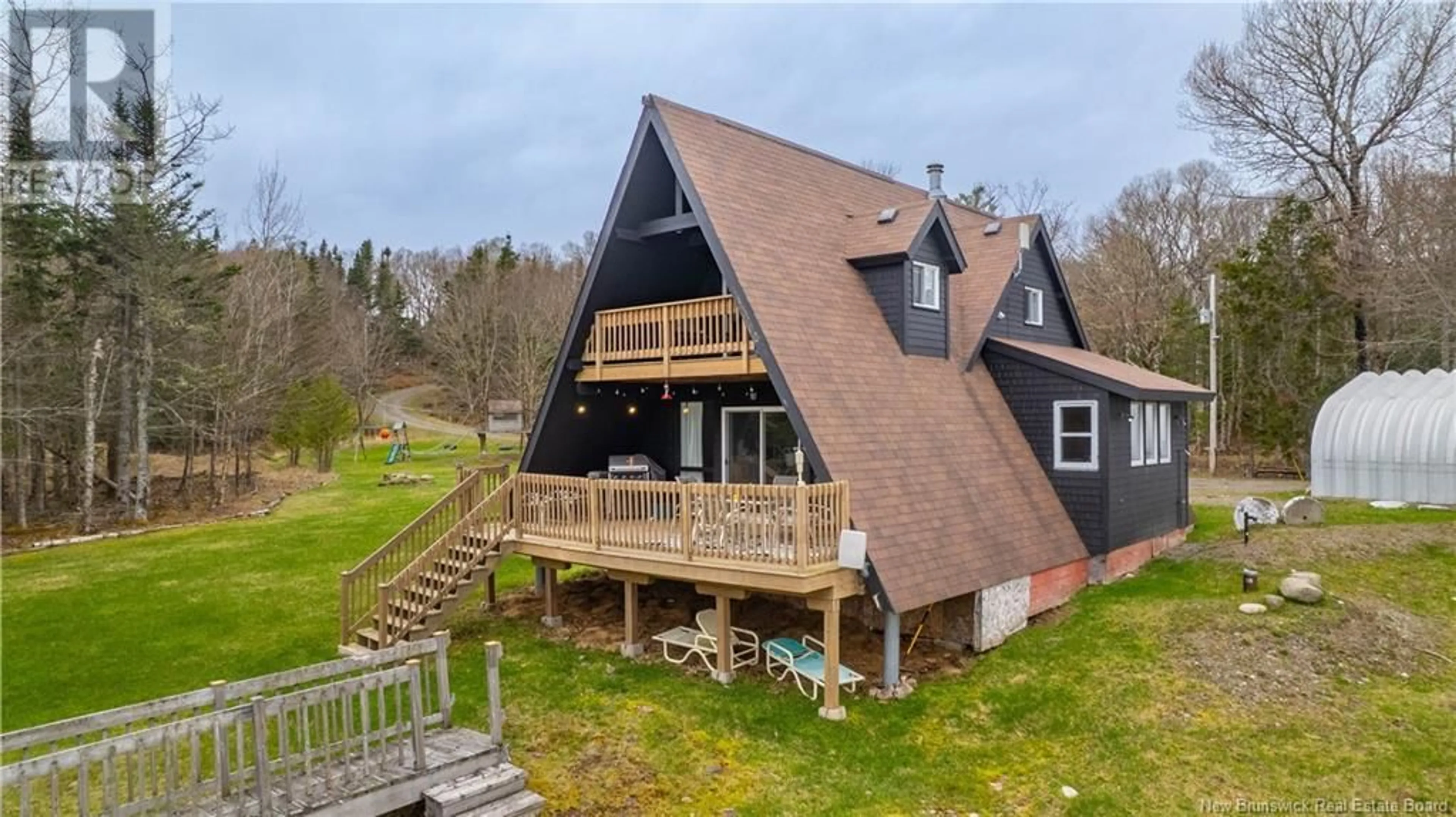 A pic from outside/outdoor area/front of a property/back of a property/a pic from drone, water/lake/river/ocean view for 49 HOLTS POINT ROAD, Bocabec New Brunswick E5B3N2