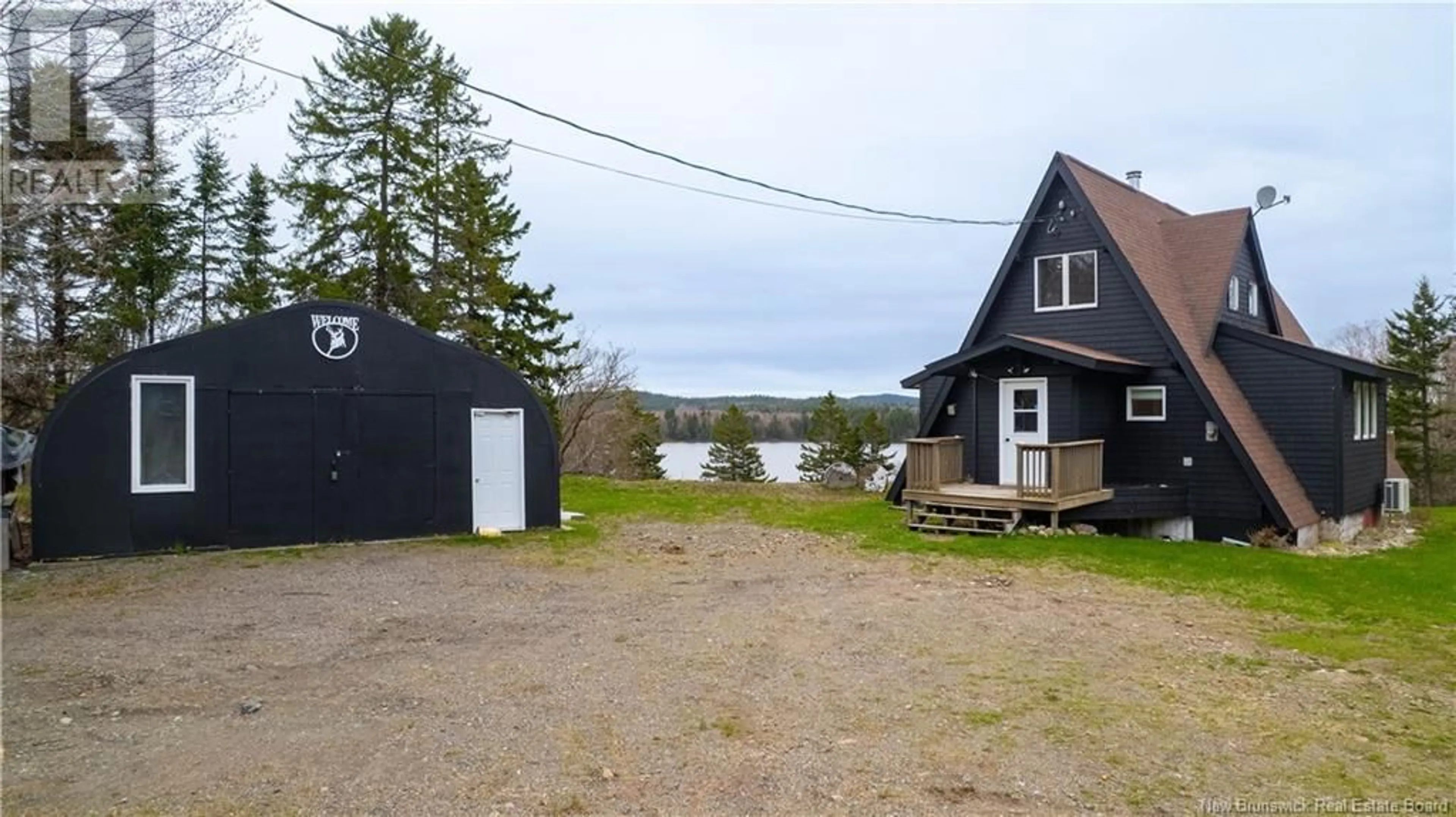 A pic from outside/outdoor area/front of a property/back of a property/a pic from drone, water/lake/river/ocean view for 49 HOLTS POINT ROAD, Bocabec New Brunswick E5B3N2