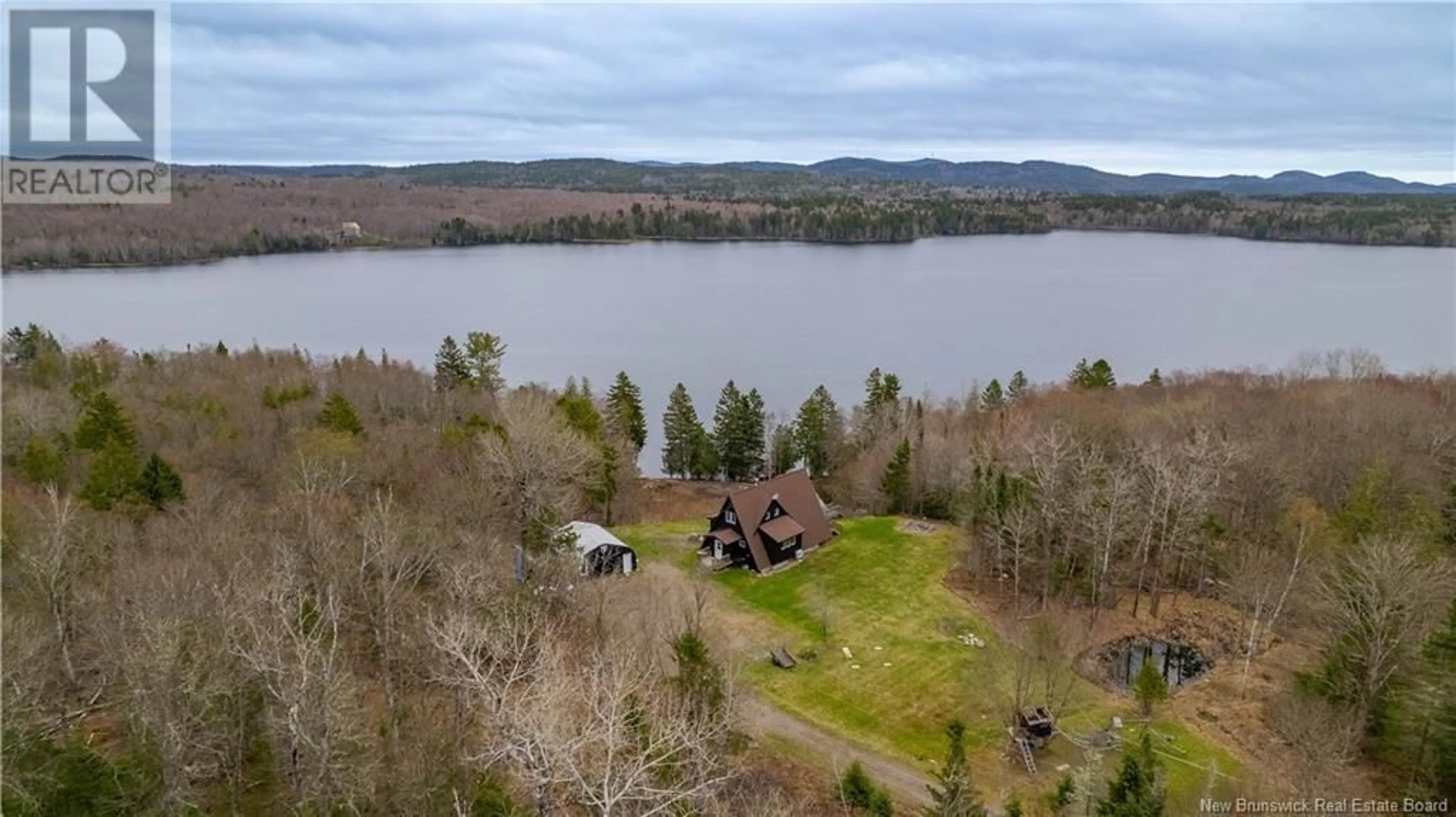 A pic from outside/outdoor area/front of a property/back of a property/a pic from drone, water/lake/river/ocean view for 49 HOLTS POINT ROAD, Bocabec New Brunswick E5B3N2
