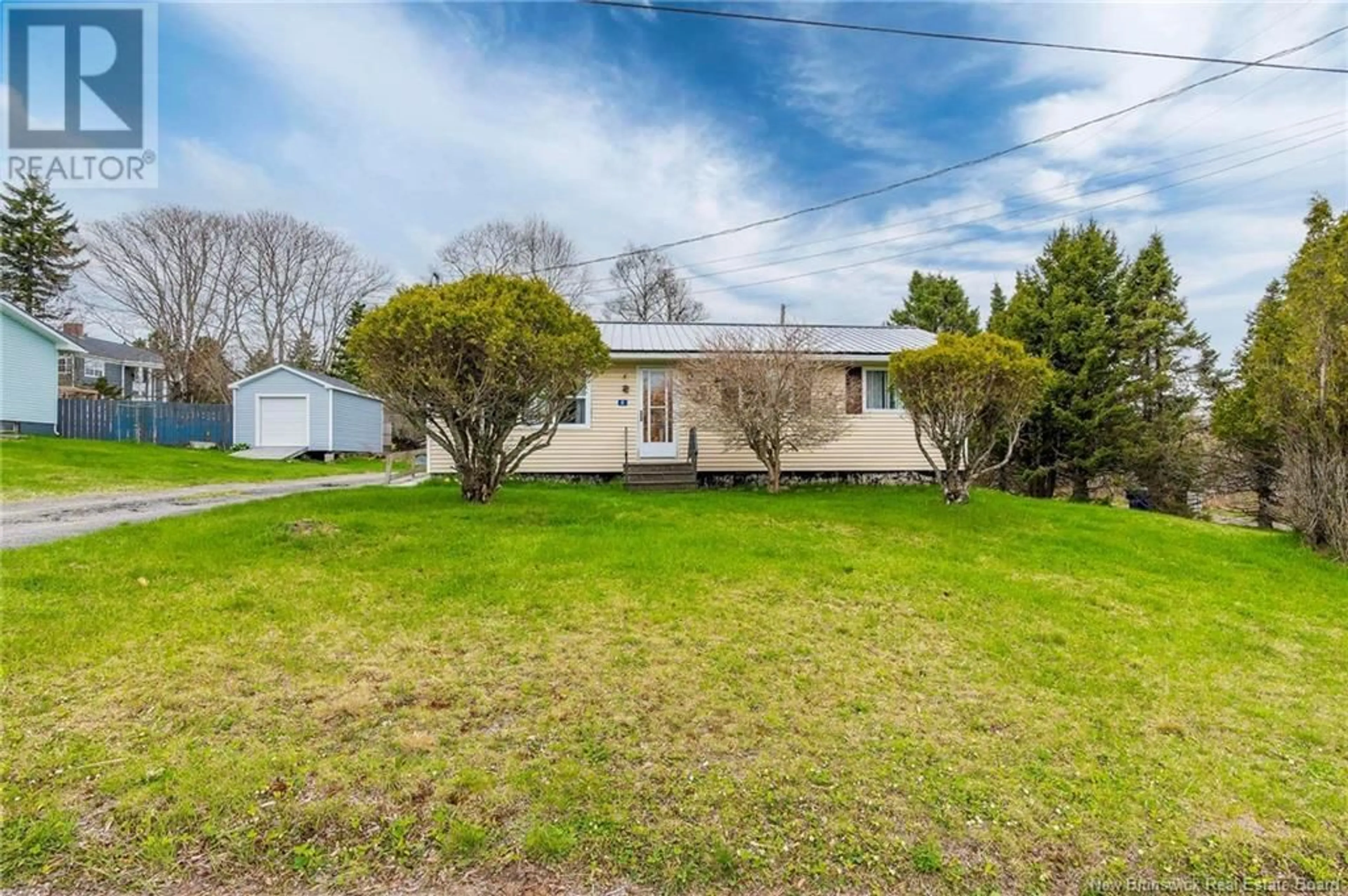 A pic from outside/outdoor area/front of a property/back of a property/a pic from drone, unknown for 4 HILLSIDE DRIVE, Blacks Harbour New Brunswick E5H1H5