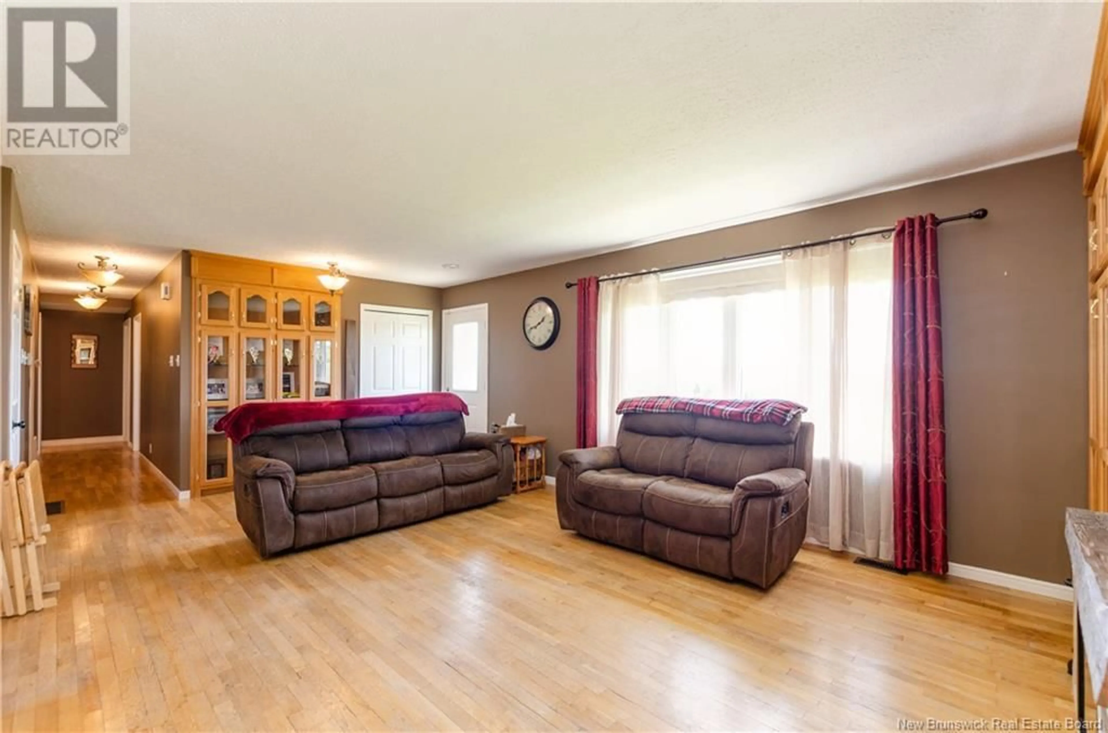 Living room with furniture, wood/laminate floor for 81 FAWCETT HILL ROAD, Fawcett Hill New Brunswick E4Z2W7