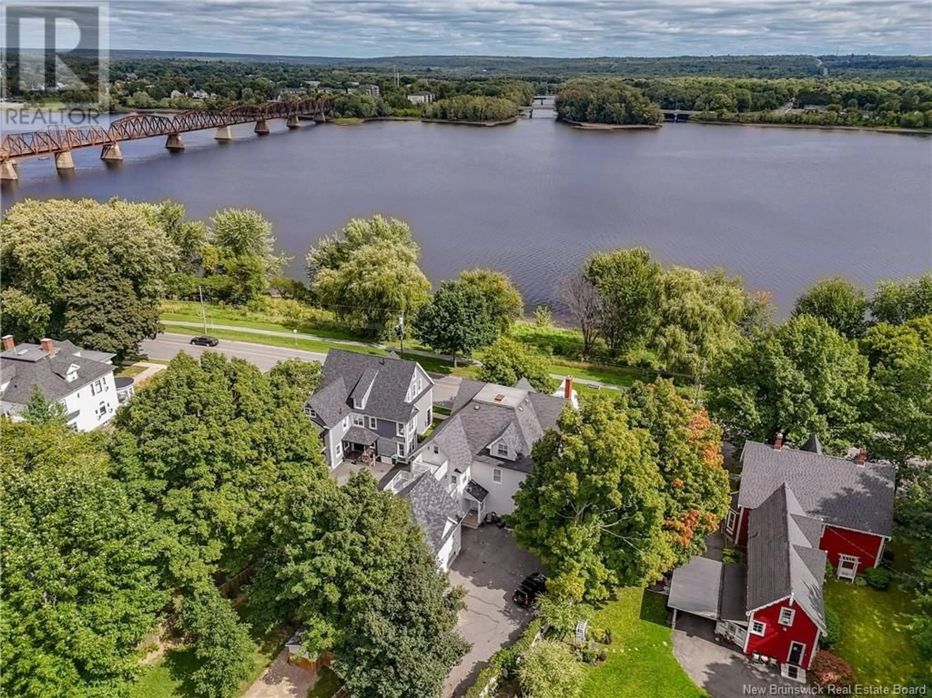 A pic from outside/outdoor area/front of a property/back of a property/a pic from drone, water/lake/river/ocean view for 82 WATERLOO ROW, Fredericton New Brunswick E3B1Y9