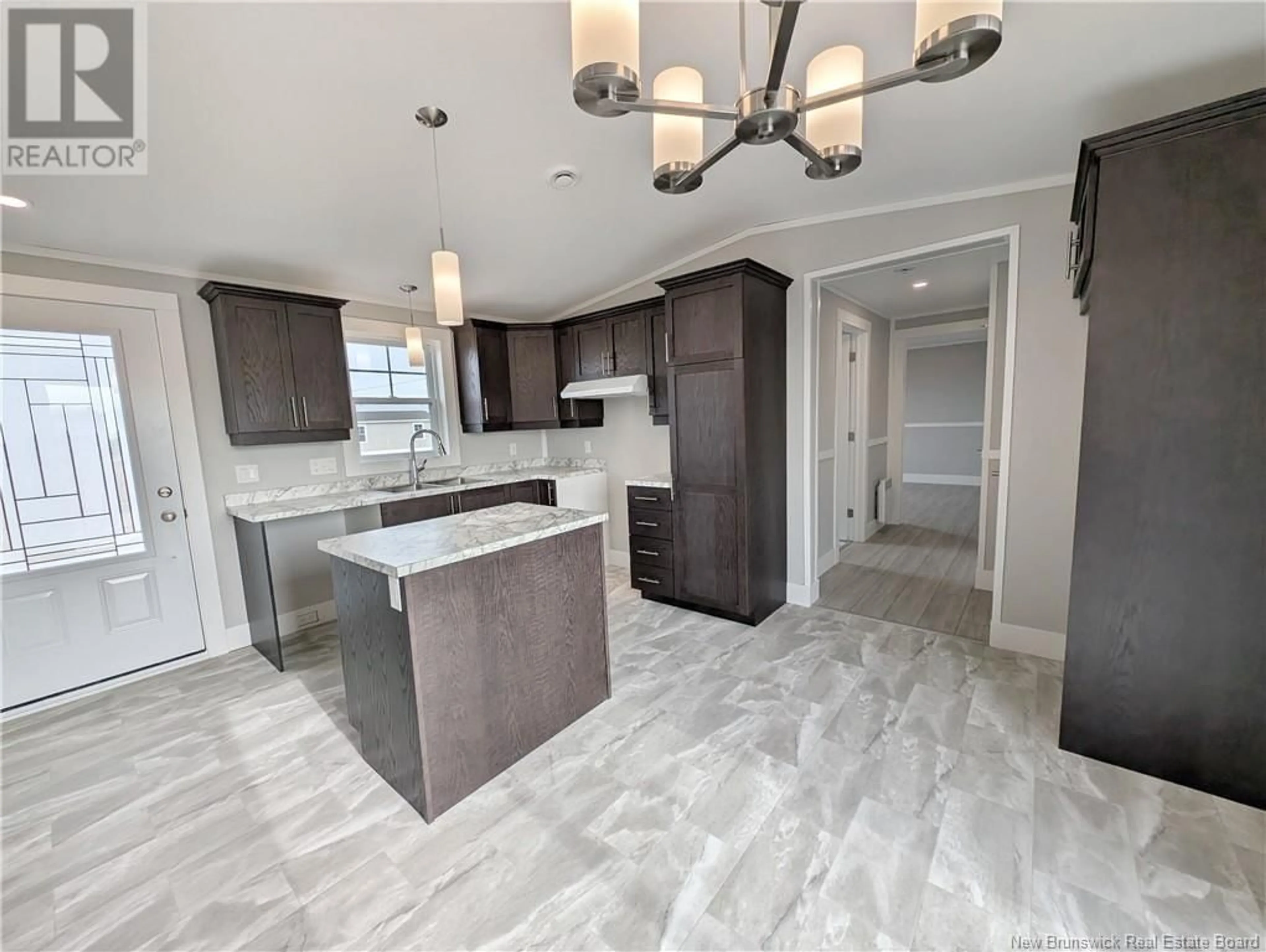 Open concept kitchen, ceramic/tile floor for 7 CHRISTINE/MARTIN STREET, Saint-Isidore New Brunswick E8M0B3