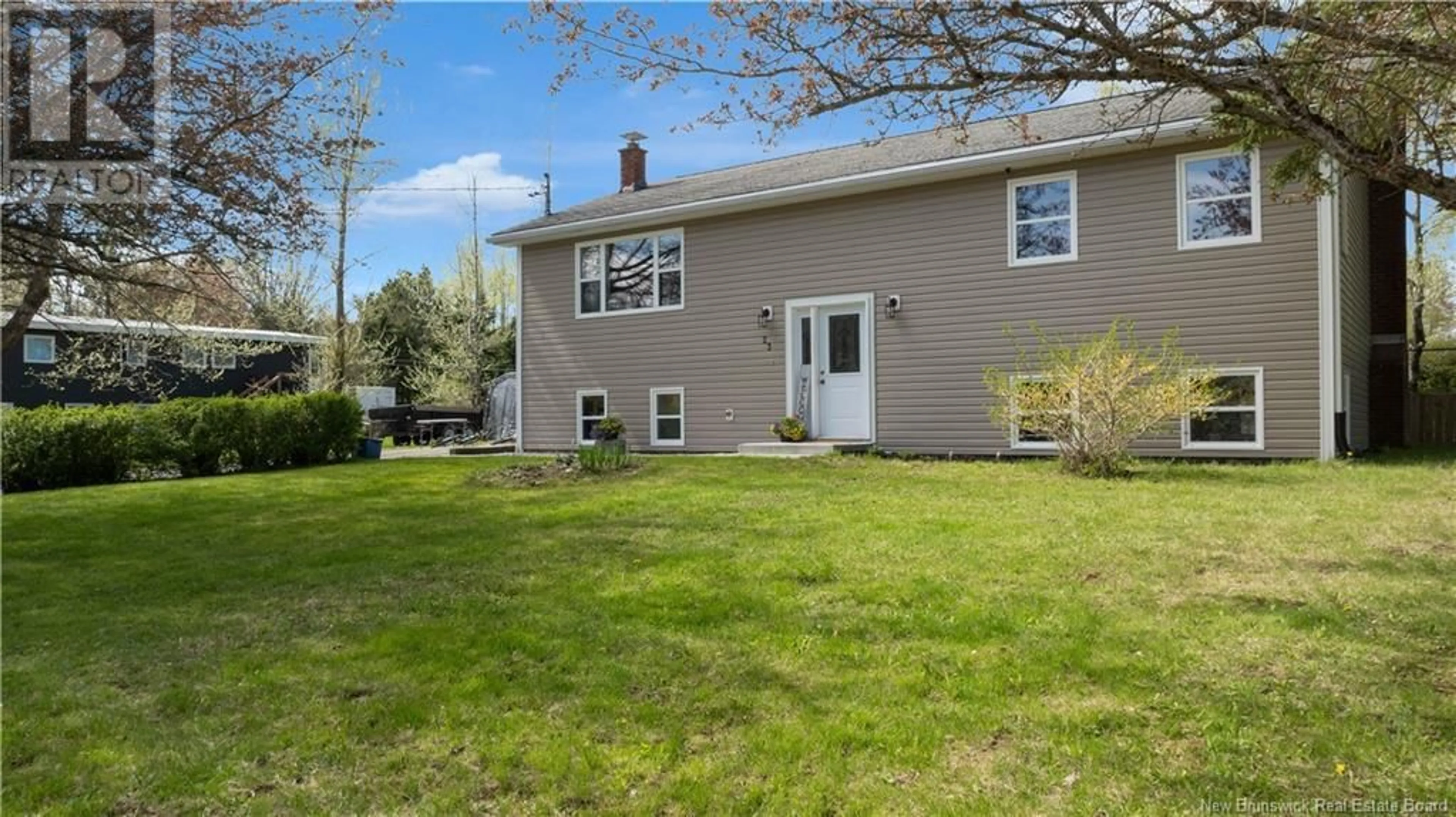 Home with vinyl exterior material, street for 23 PHILLIPS DRIVE, Quispamsis New Brunswick E2E4T7