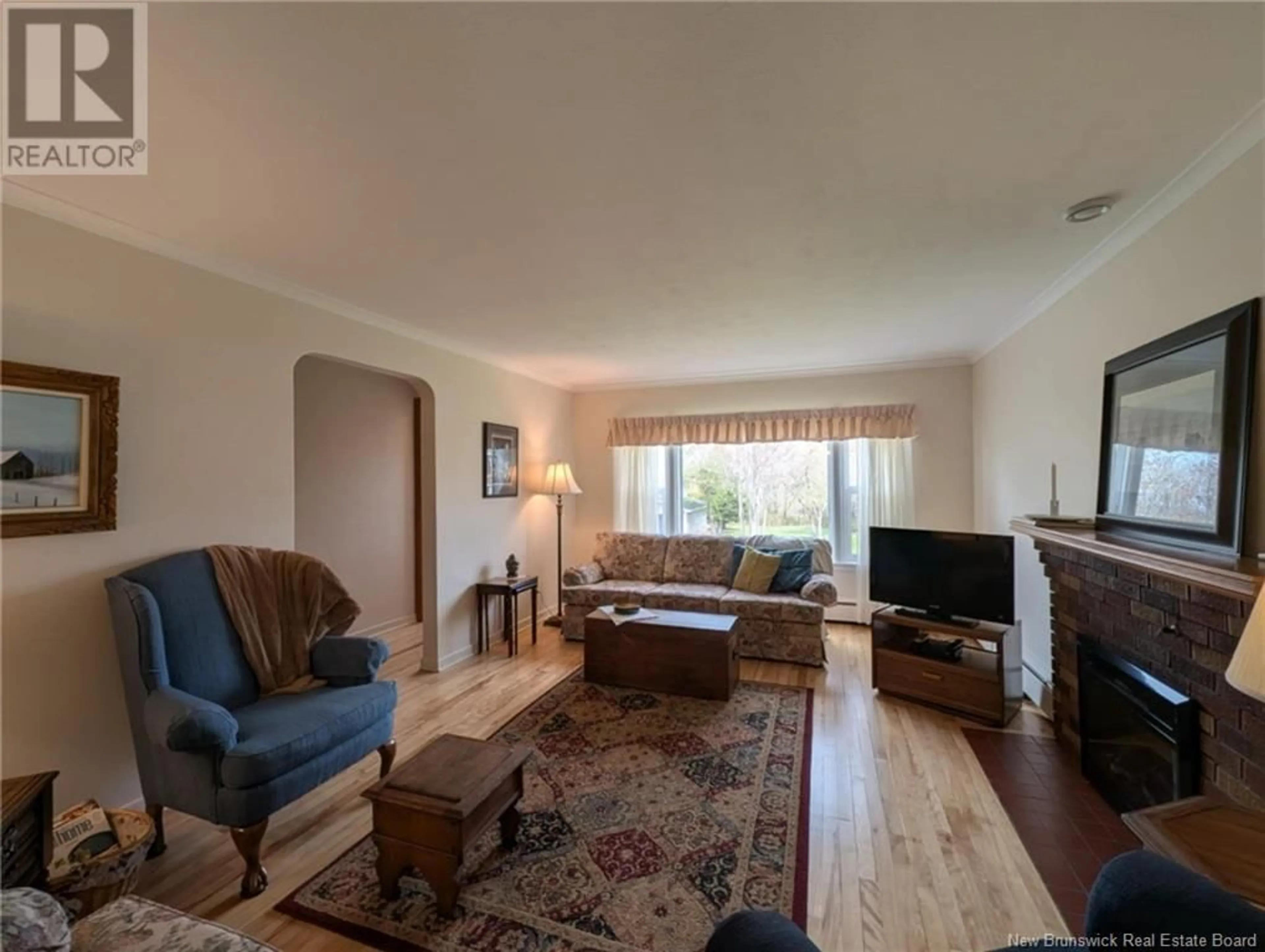 Living room with furniture, wood/laminate floor for 128 AUDREY ROAD, Riverview New Brunswick E1B1P5