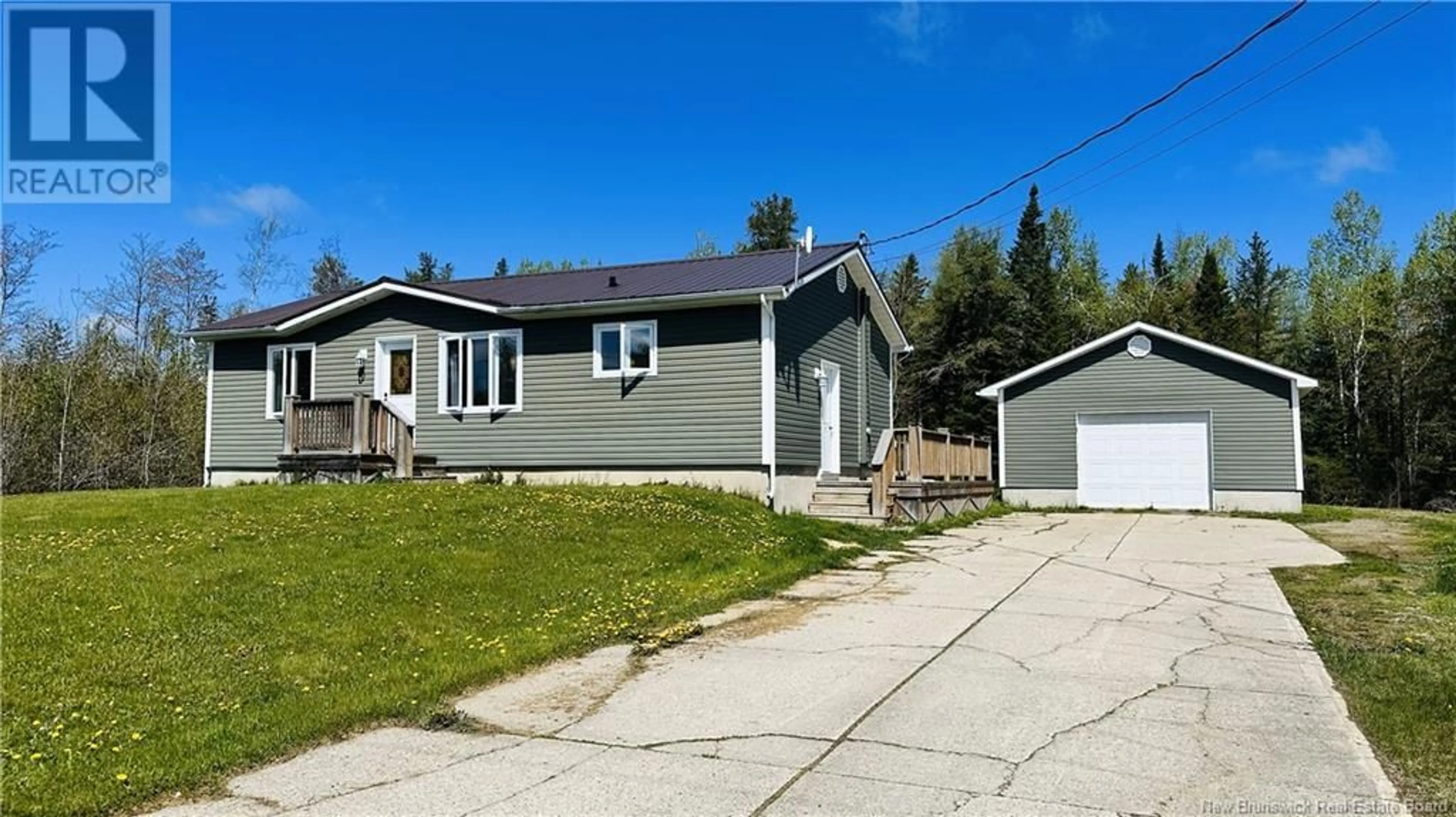 Home with vinyl exterior material, street for 412 CH SAPIN COURT, Rogersville New Brunswick E4Y1V4