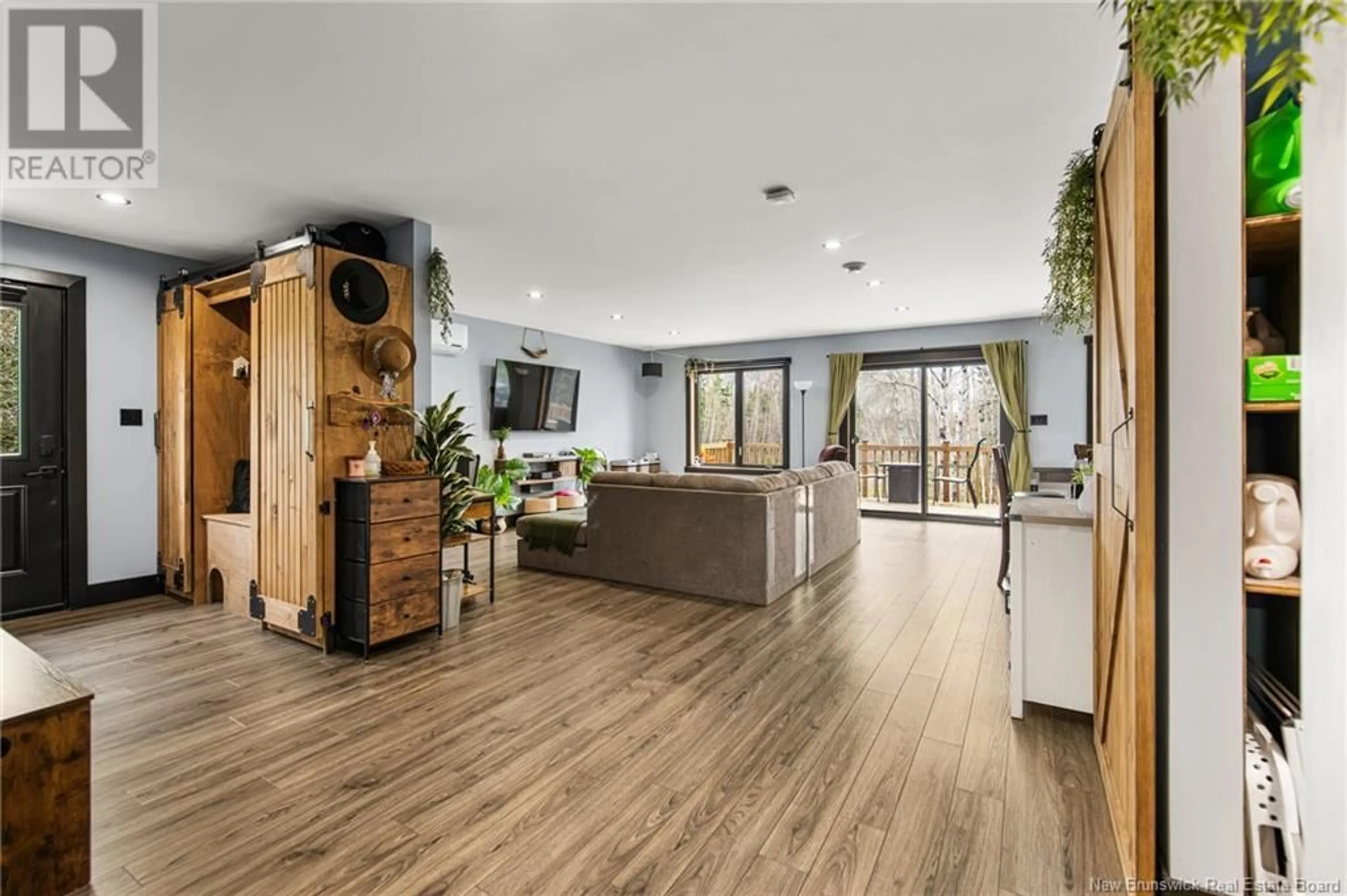 Open concept kitchen, wood/laminate floor for 18 DEEPWOOD AVENUE, Salisbury New Brunswick E4J2B3