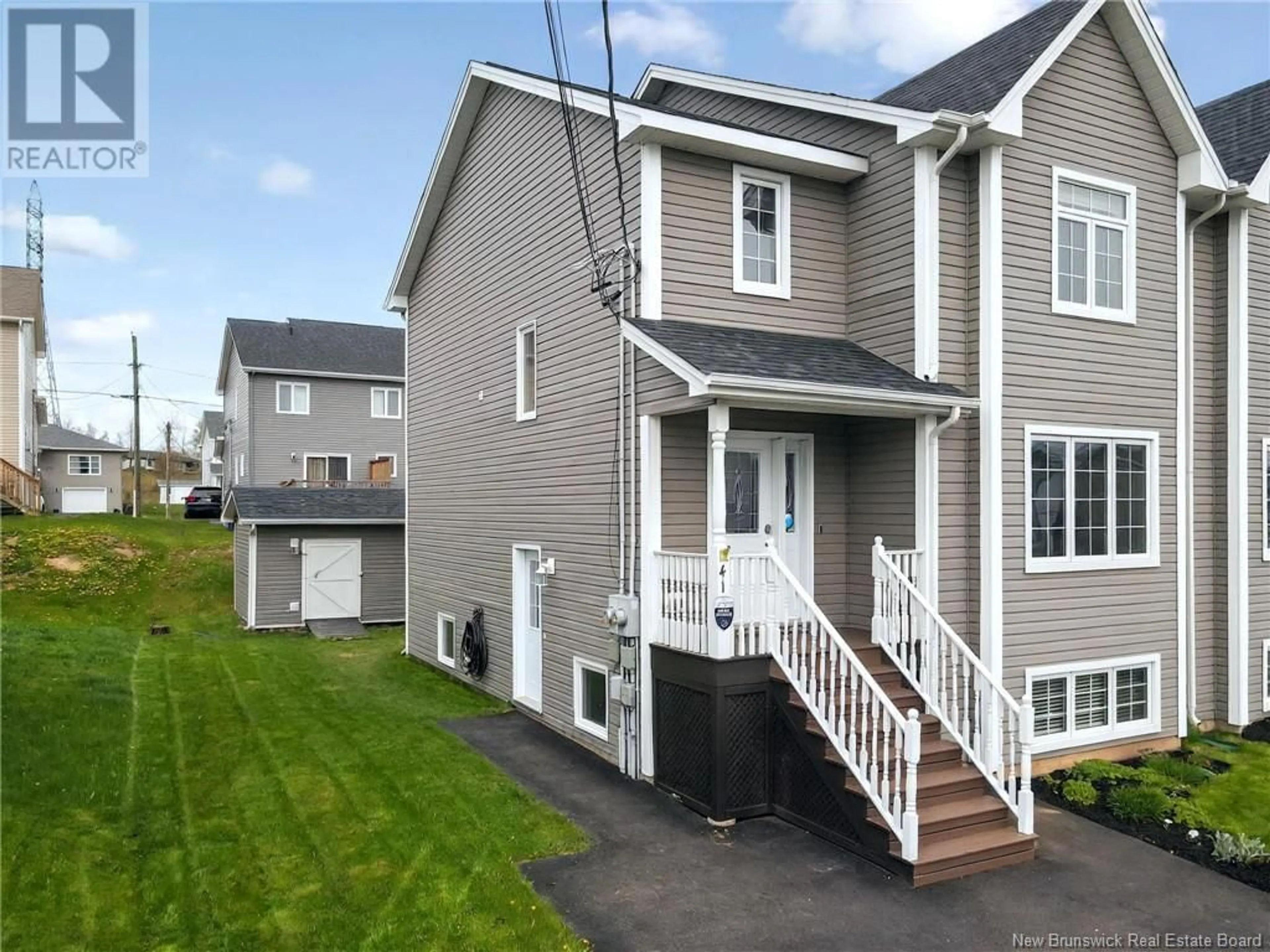 Home with vinyl exterior material, street for 41 RUBY WAY, Moncton New Brunswick E1E0H4