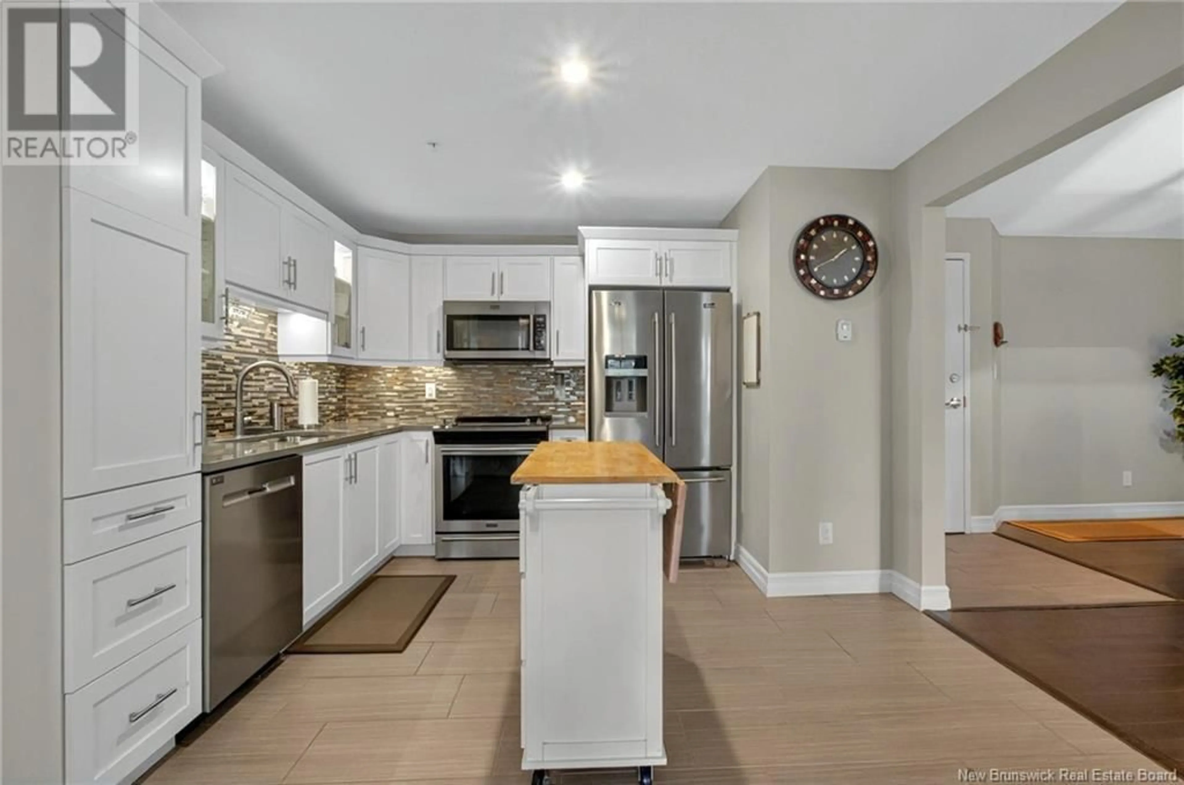 Open concept kitchen, ceramic/tile floor for 408 - 208 COVERDALE ROAD, Riverview New Brunswick E1B0M7