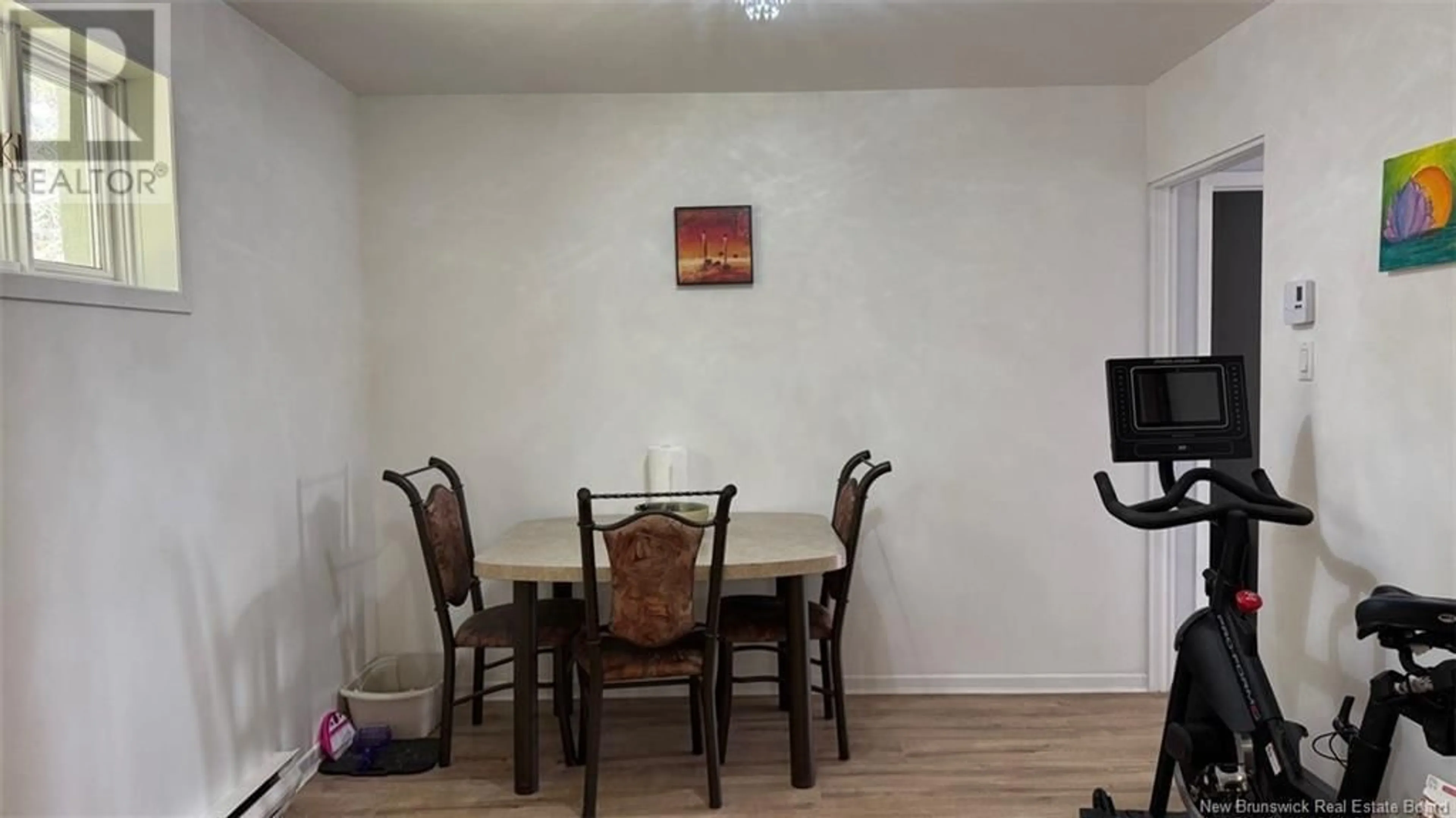 Dining room, wood/laminate floor for 748 CANADA ROAD, Edmundston New Brunswick E3V1W4