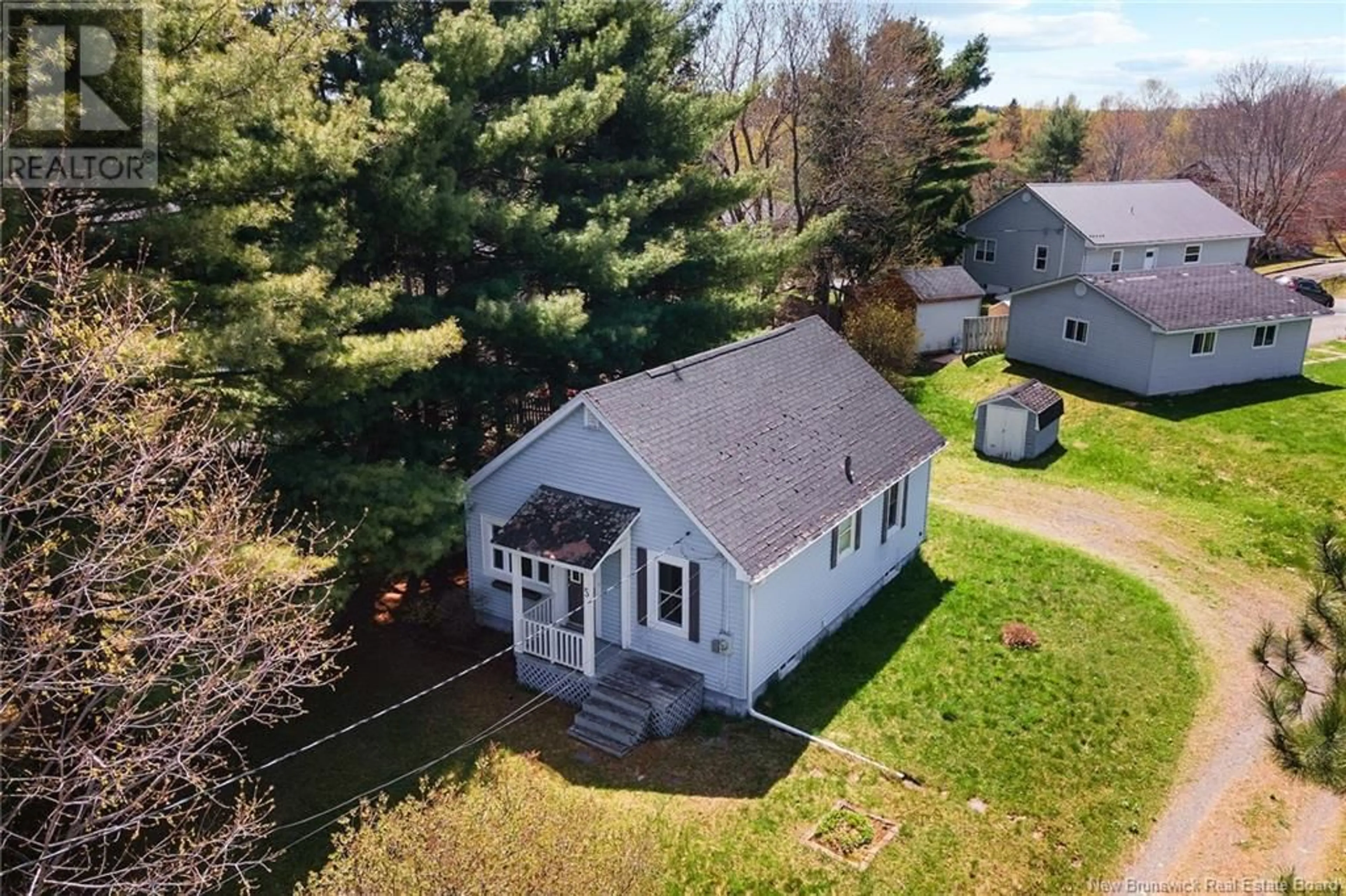A pic from outside/outdoor area/front of a property/back of a property/a pic from drone, unknown for 5 MCKINLEY AVENUE, Fredericton New Brunswick E3A4R3